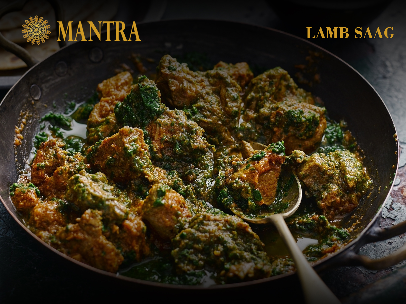 Order Lamb Saag food online from Mantra restaurant store, Jersey City on bringmethat.com