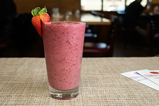 Order Mixed Berry Smoothie* food online from Tomate Cafe store, Berkeley on bringmethat.com