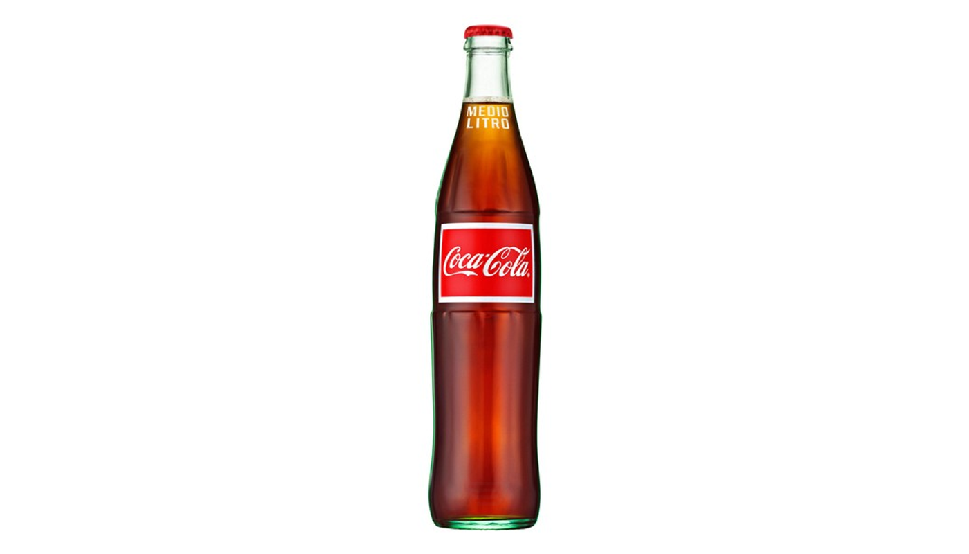 Order Mexican Coke 16.09 oz Glass Bottle food online from House Of Cigar & Liquor store, Redondo Beach on bringmethat.com