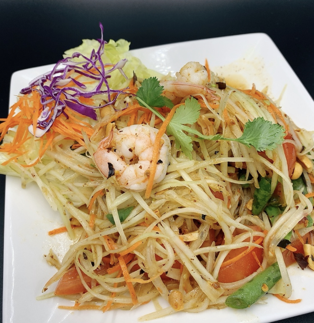 Order Som Tum food online from Exotic Thai Cafe store, Woodland Hills on bringmethat.com