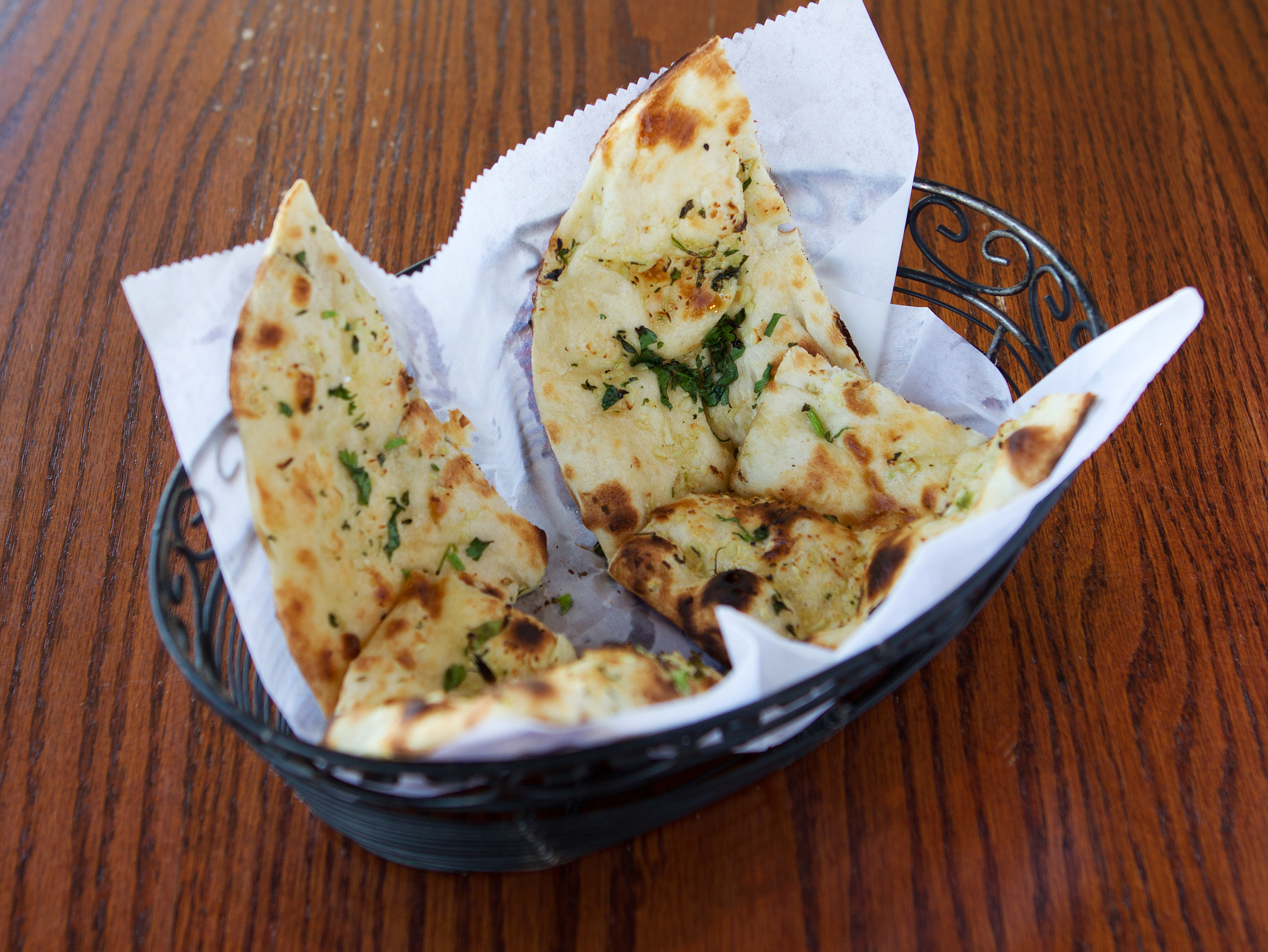 Order Garlic Naan food online from The Mynt store, San Jose on bringmethat.com