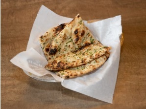 Order Butter Naan food online from Sattva Indian Rasoi store, Mission Viejo on bringmethat.com