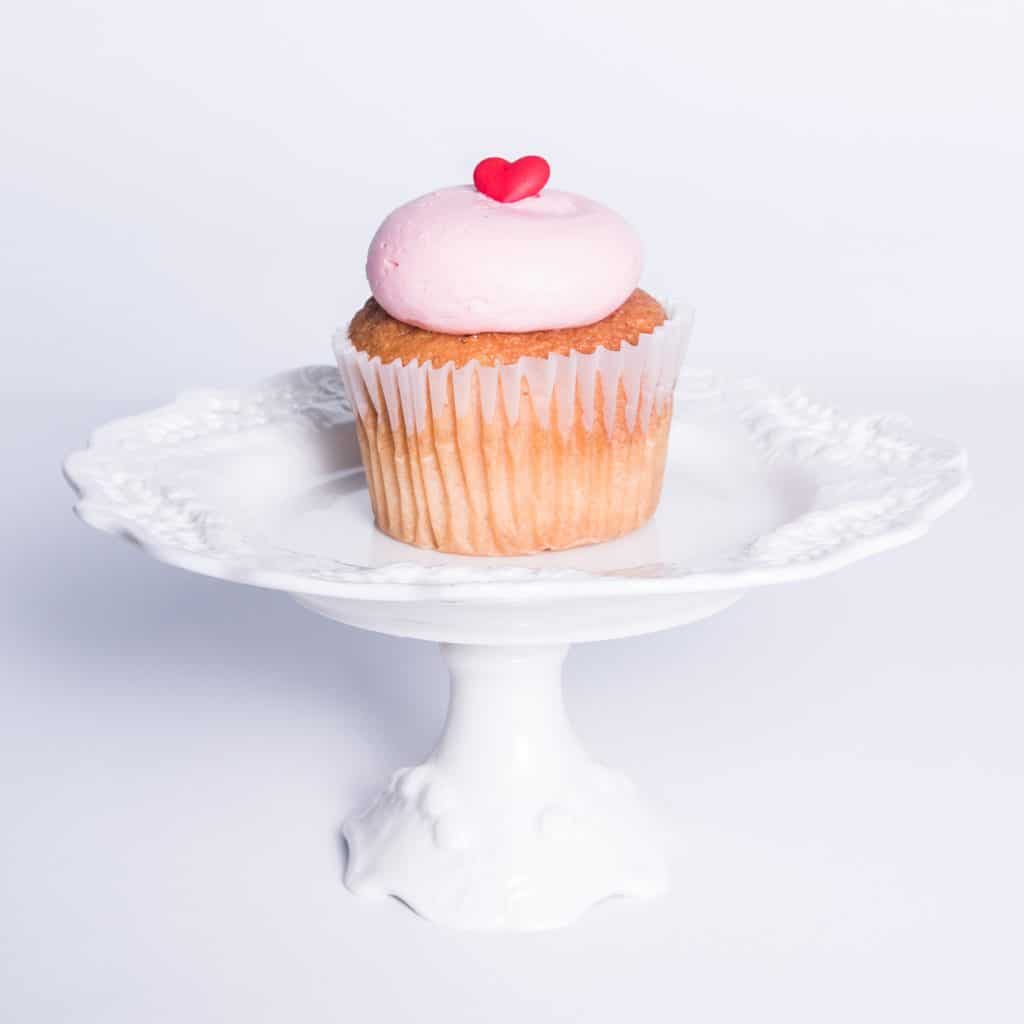 Order Strawberry Passion Cupcake food online from Camicakes Creamery store, Smyrna on bringmethat.com