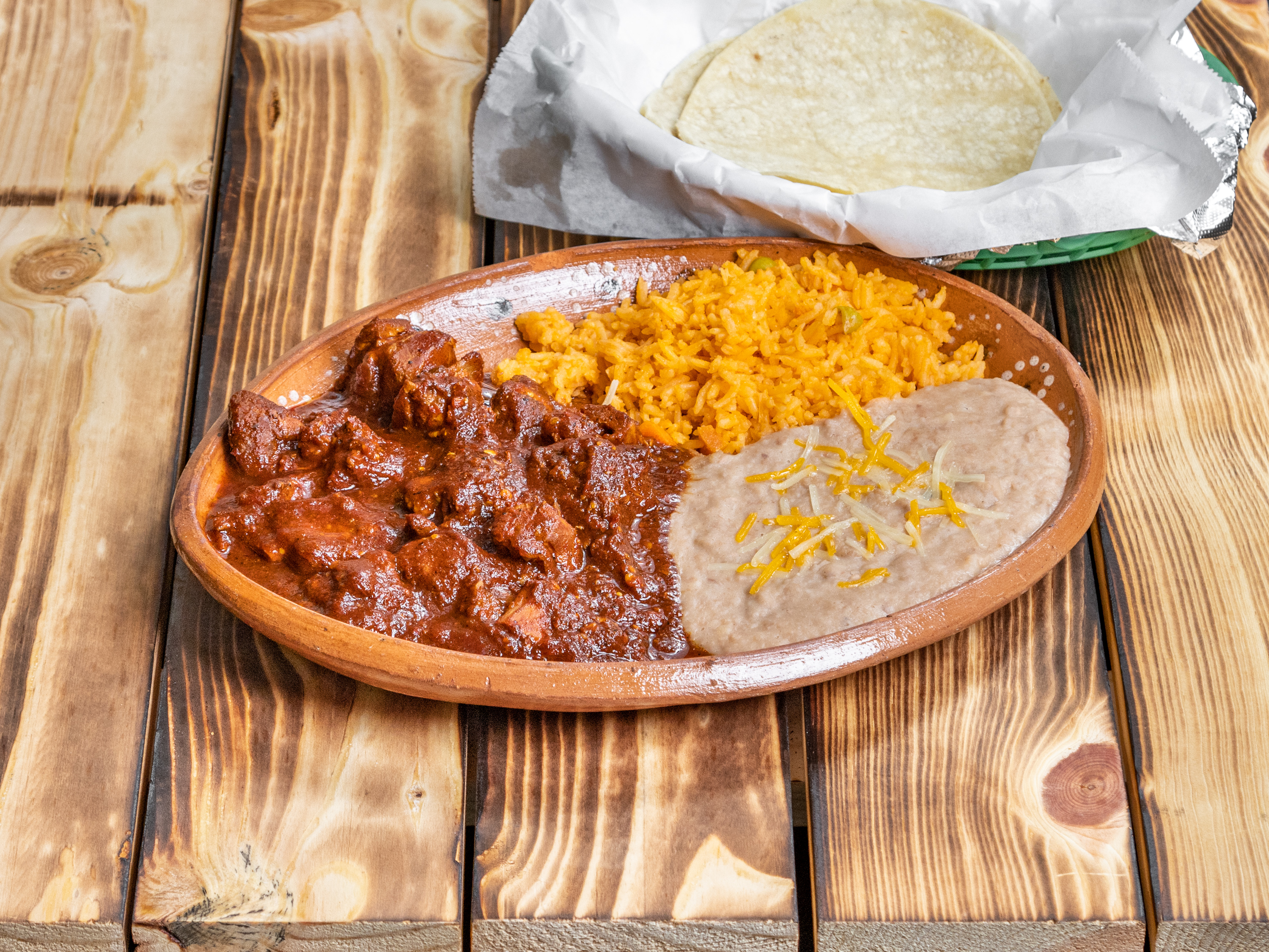 Order Guiso de Puerco Lunch food online from Restaurant Y Tacos El Chino store, Dallas on bringmethat.com