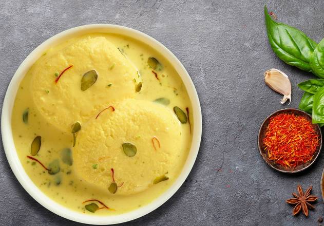 Order Ras Malai food online from Vegetarian Curry Tradition store, Madison on bringmethat.com