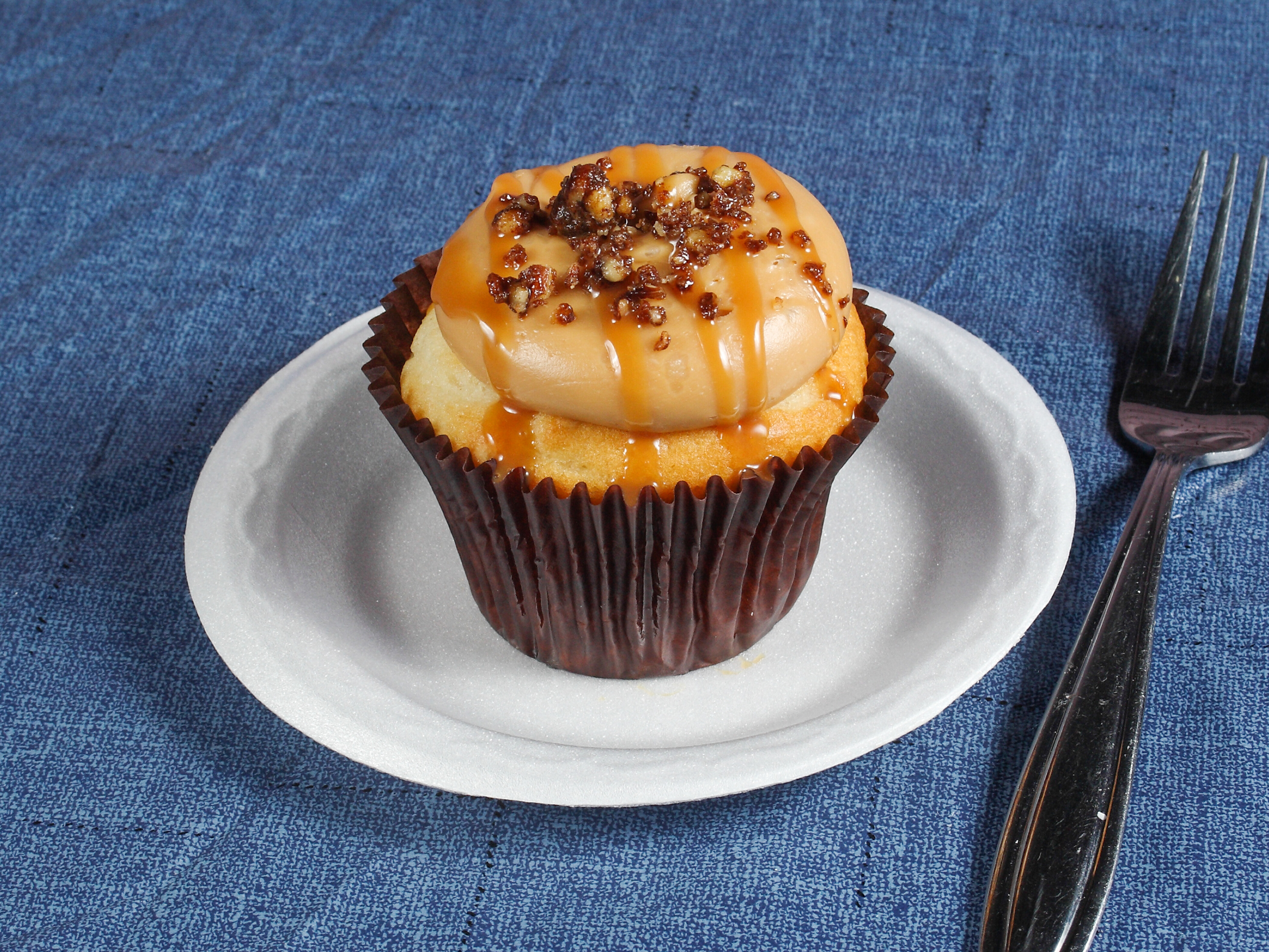 Order Salted Caramel Cupcake food online from Smallcakes store, Huntersville on bringmethat.com