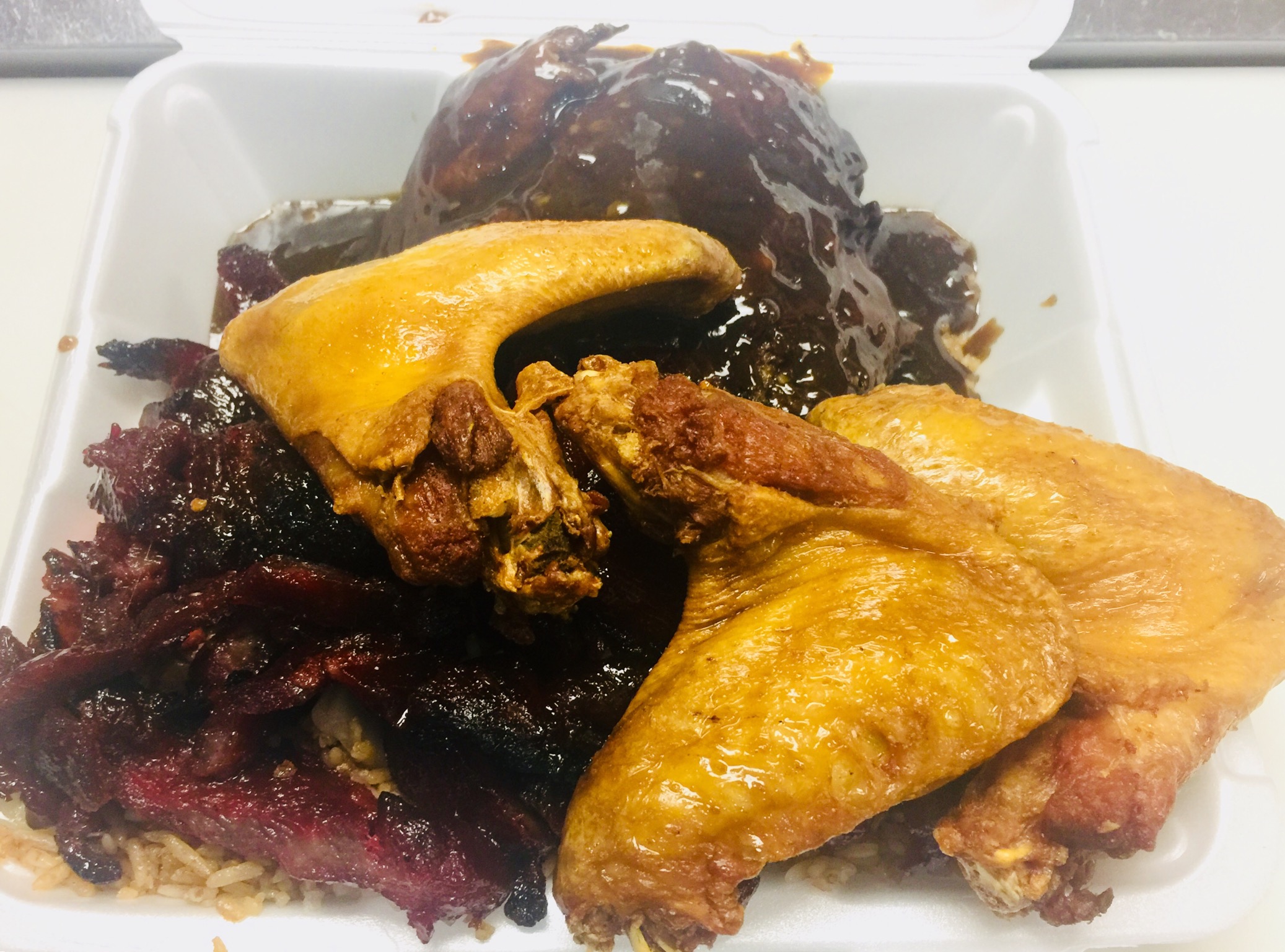 Order D2. Chicken Wings, Boneless Ribs, Fried Rice and Egg Foo Young Combo food online from New Hong Kong Village store, Medford on bringmethat.com