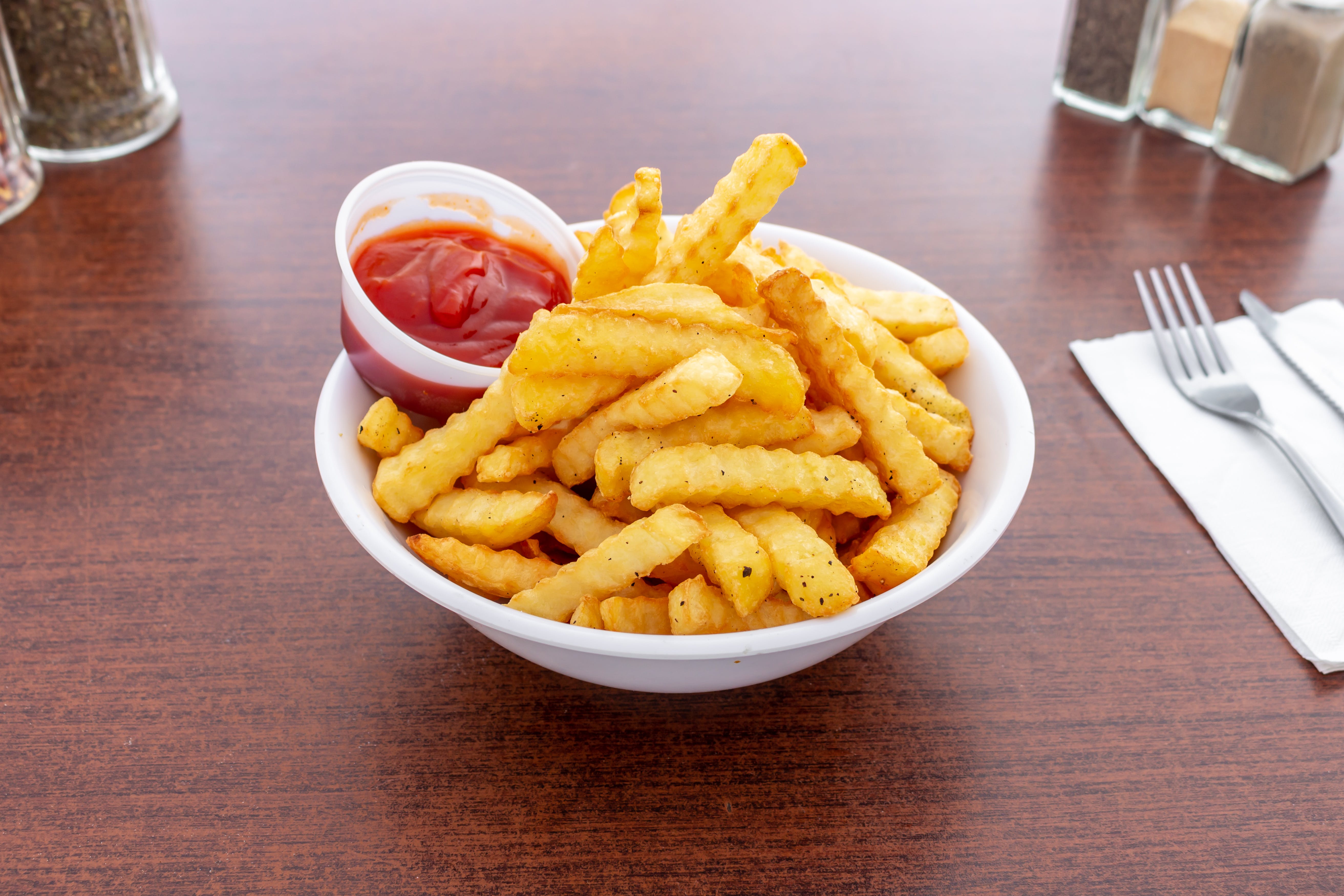 Order French Fries - Appetizer food online from Sopranos Pizzeria store, New Milford on bringmethat.com