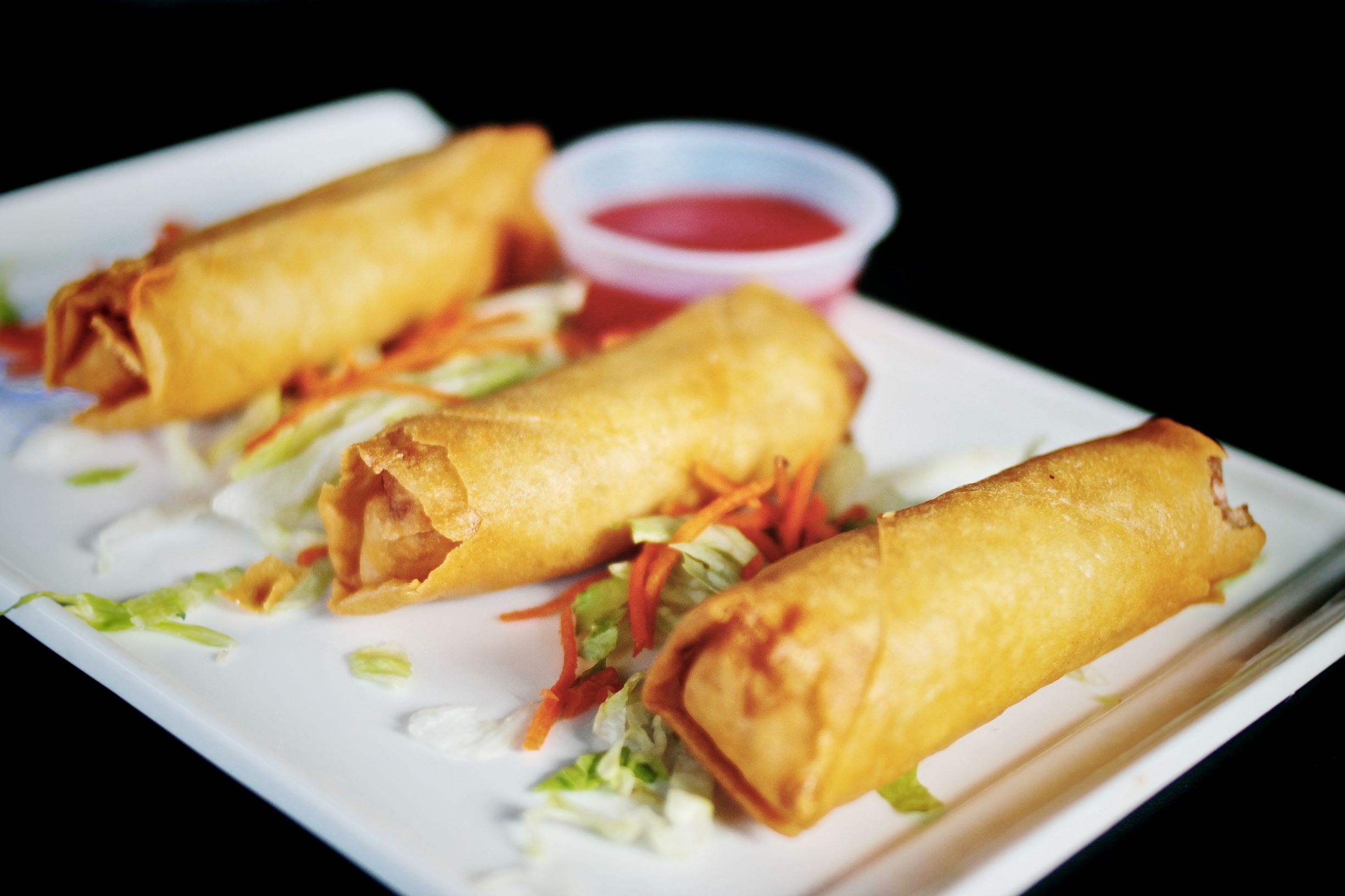 Order Vegetarian Egg Roll (3 pcs) food online from Bamboo Bistro Westgate store, Austin on bringmethat.com