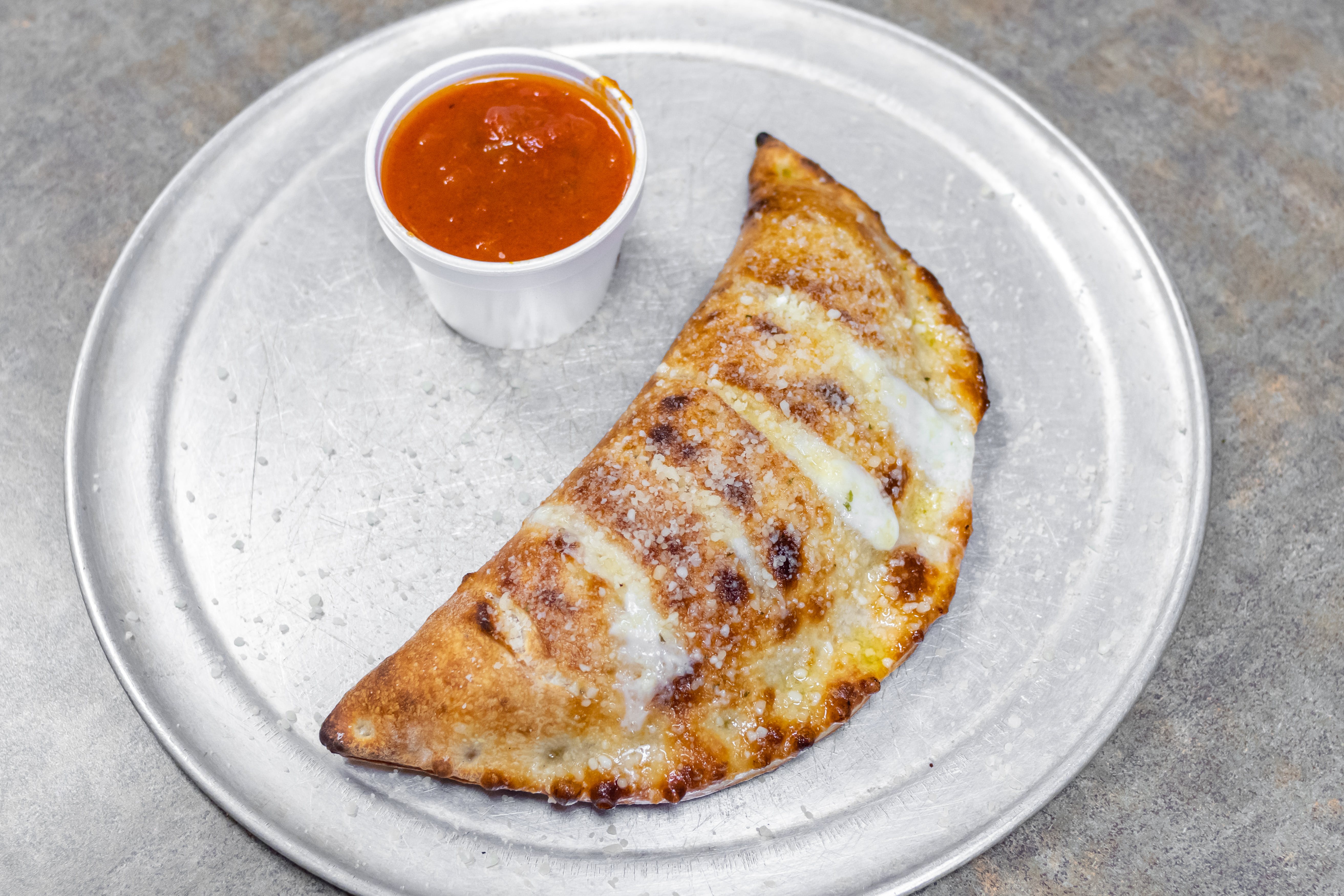 Order Calzone - Small food online from North End Pizza store, Oviedo on bringmethat.com