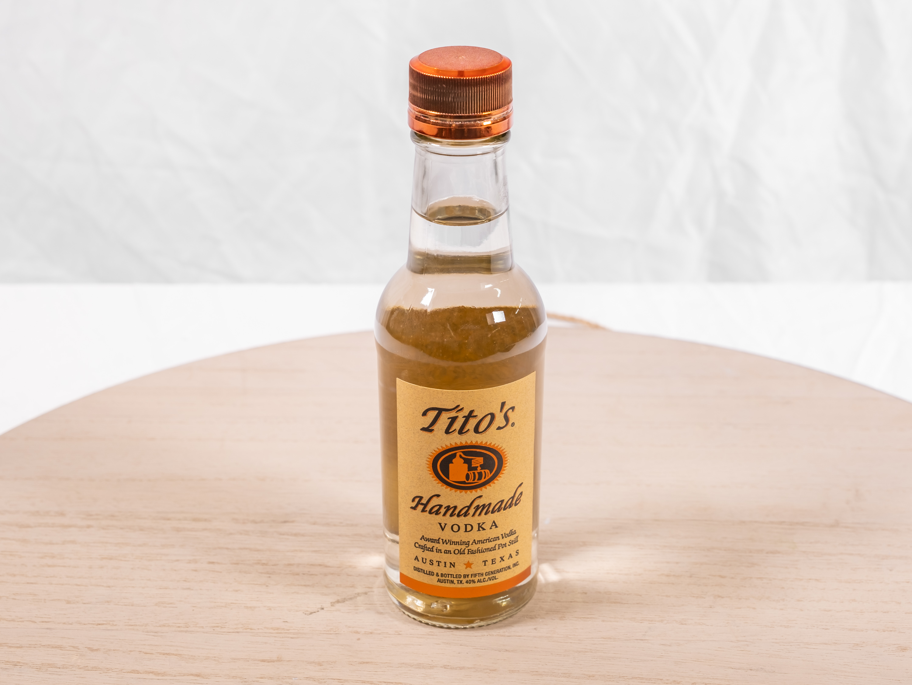 Order 200 ml. Tito's Vodka food online from M & G Market store, Highland on bringmethat.com