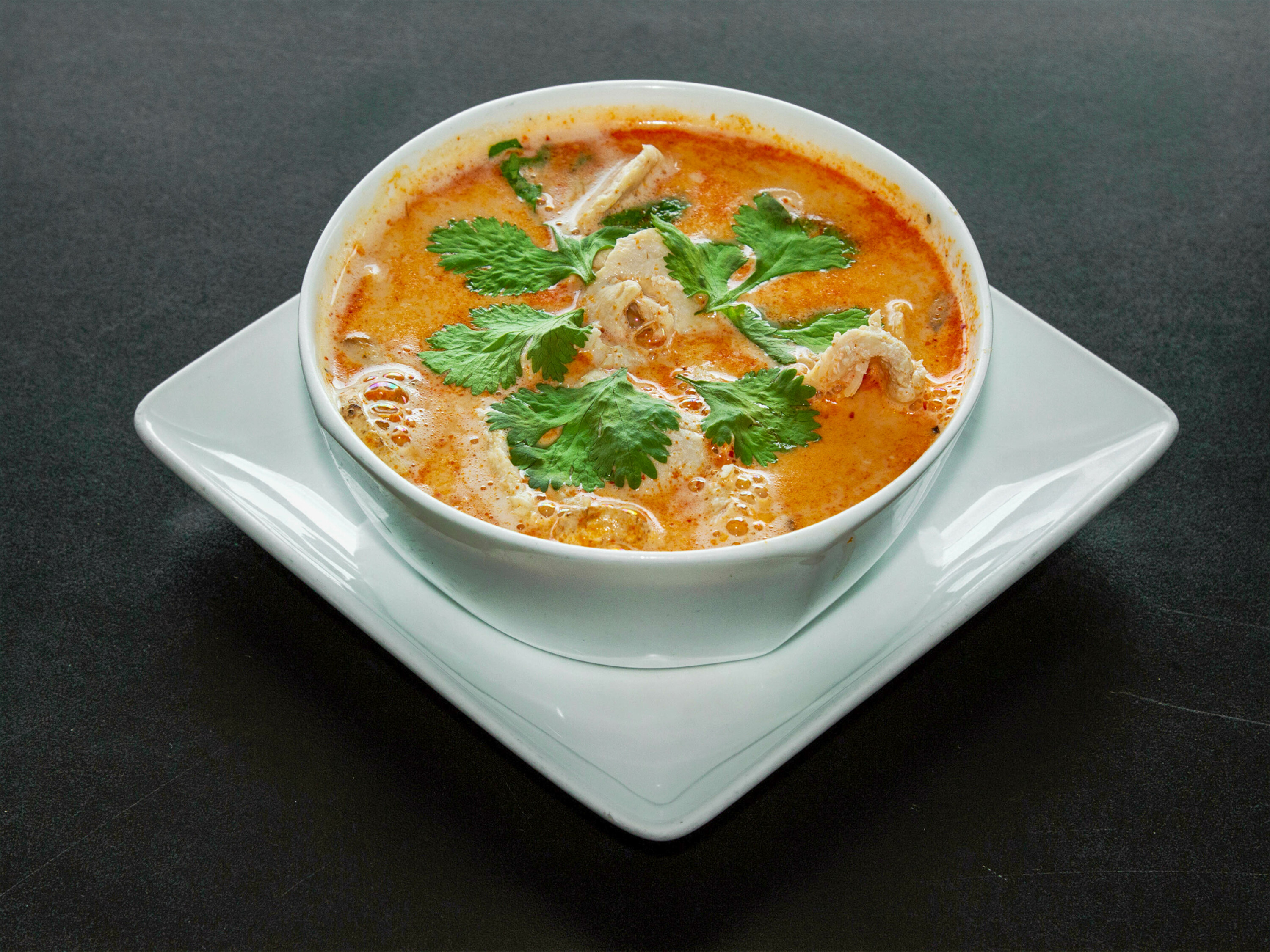 Order S.1- Chicken Thai Galangal Coconut Soup food online from Bismillah Restaurant store, Hanover on bringmethat.com