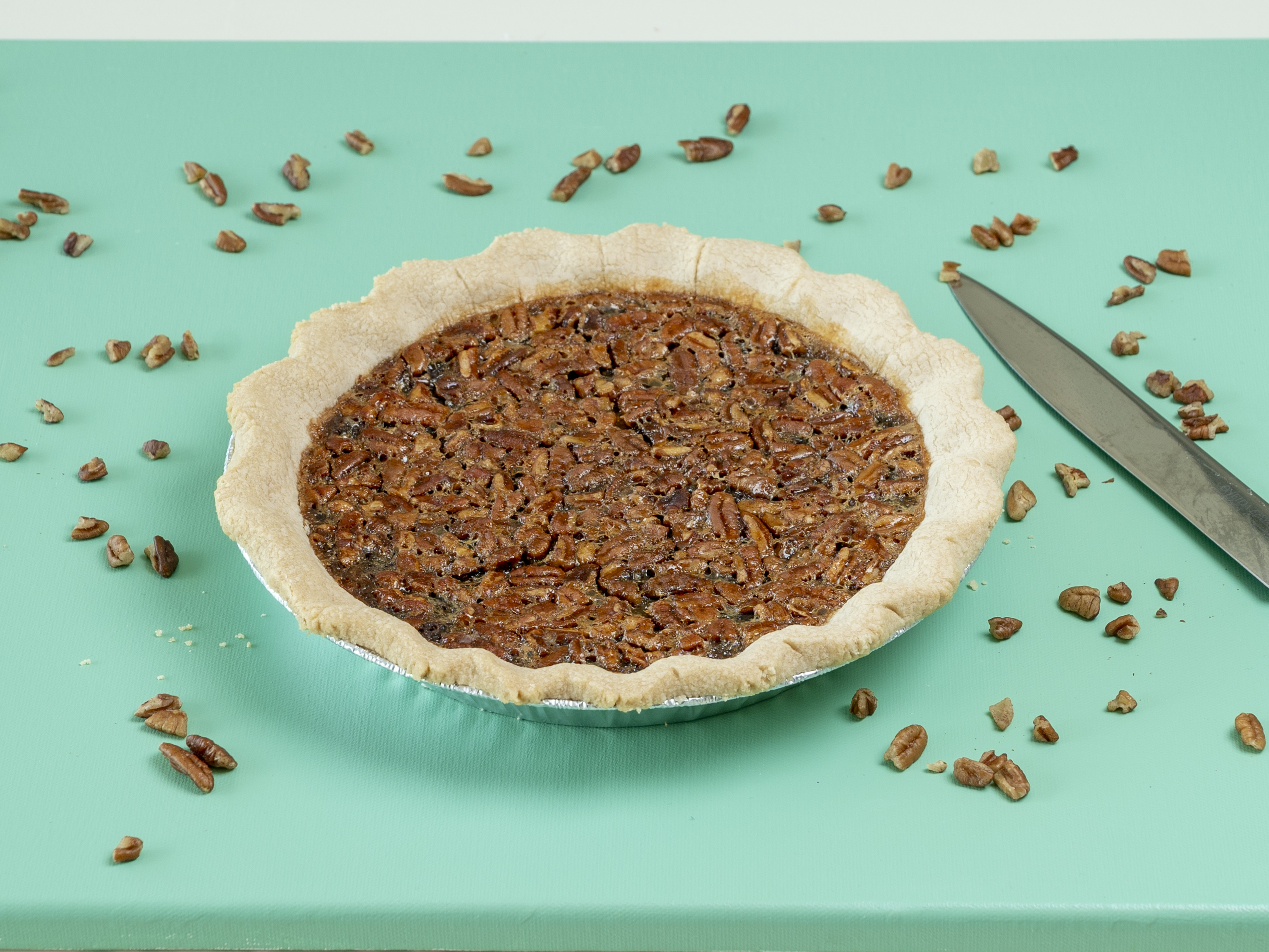 Order 9" Pecan Chocolate Chip Pie food online from Batch Bakery store, Frisco on bringmethat.com