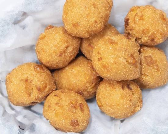 Order Hush Puppies (10 pcs) food online from Tasty Crab House store, Douglasville on bringmethat.com