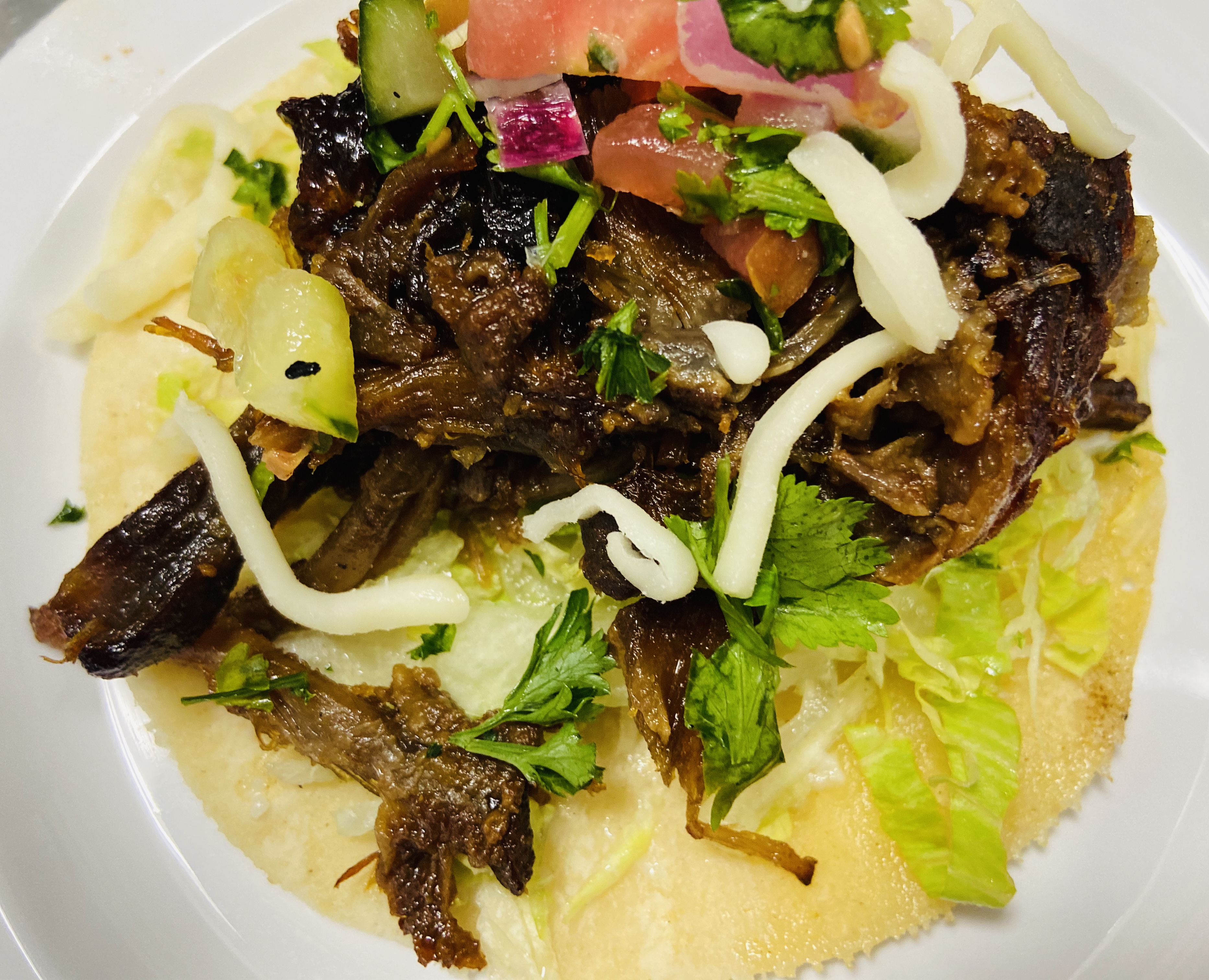 Order Carnitas Taco (single) food online from Off The Boat Fish Grill store, Tustin on bringmethat.com