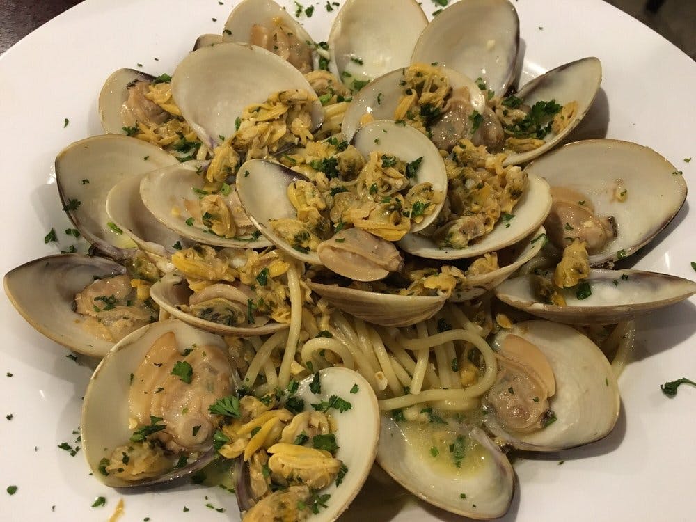 Order Spaghetti with Mussels - Entree food online from Dinos Pizza & Pasta store, Bridgeport on bringmethat.com