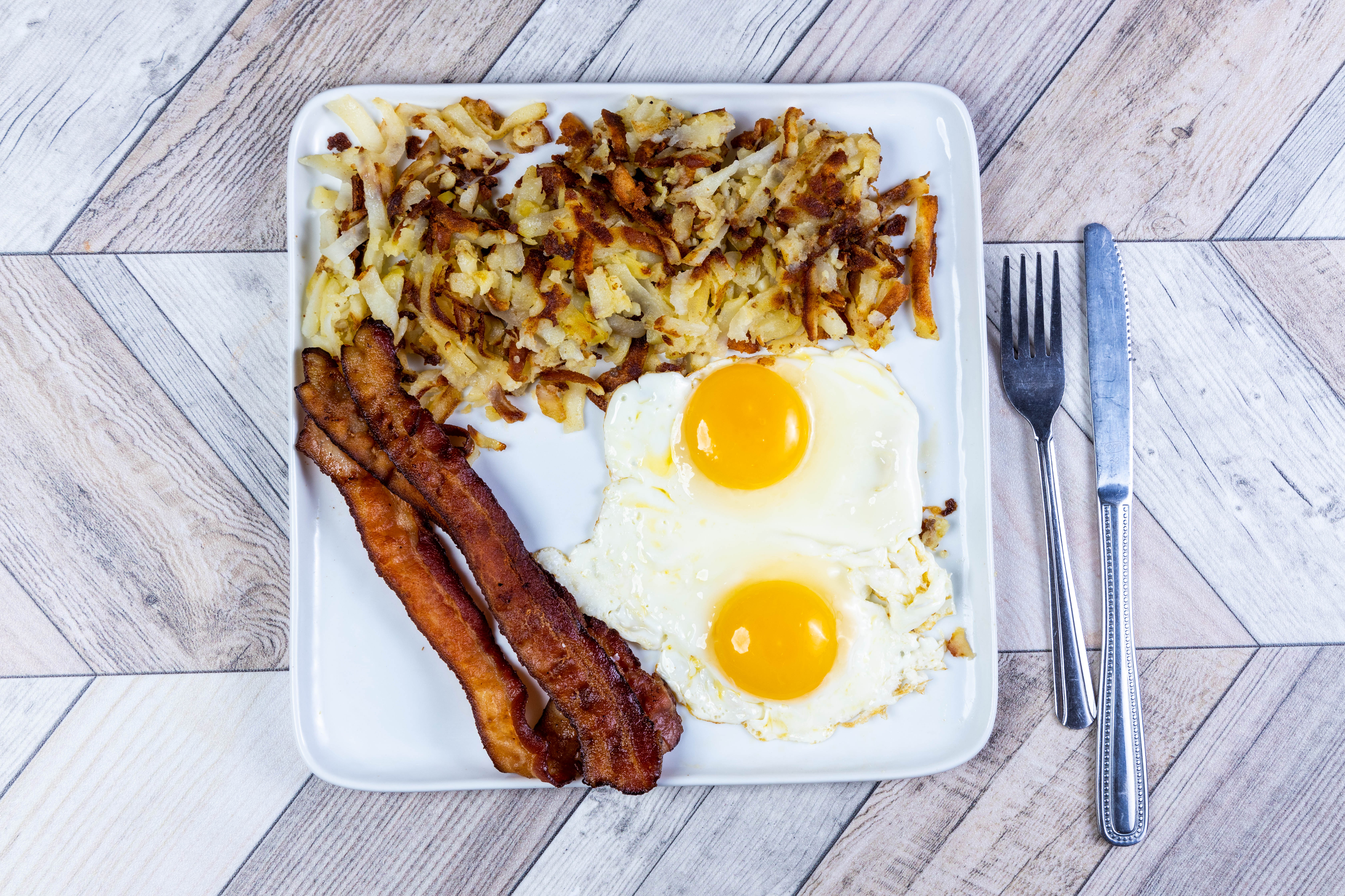 Order Extra Large Eggs Any Style with Bacon food online from Top View Restaurant store, Chicago on bringmethat.com