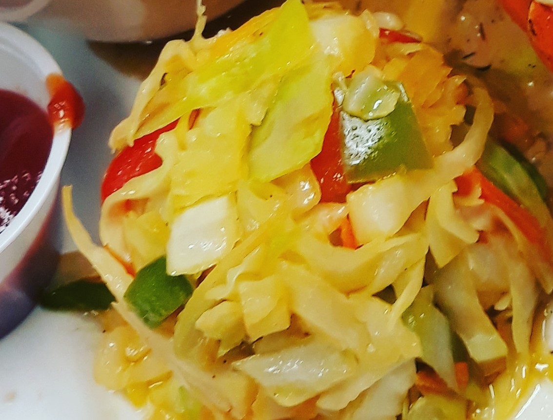 Order Sauteed Cabbage food online from Spice Island Grill store, Colorado Springs on bringmethat.com