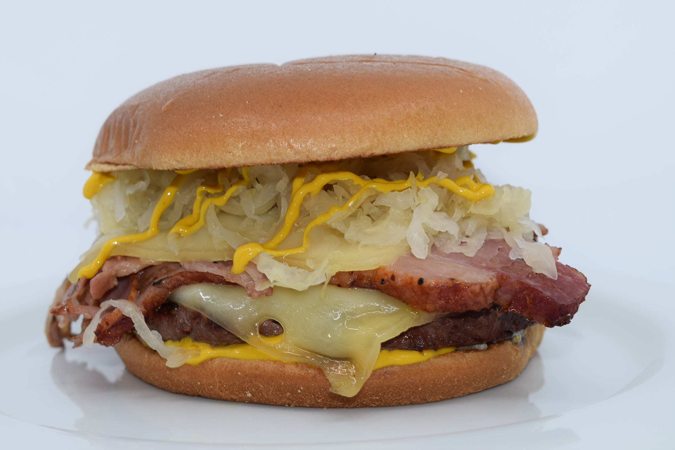 Order THE PASTRAMI SWISS BURGER food online from Mad House Comedy Club store, San Diego on bringmethat.com