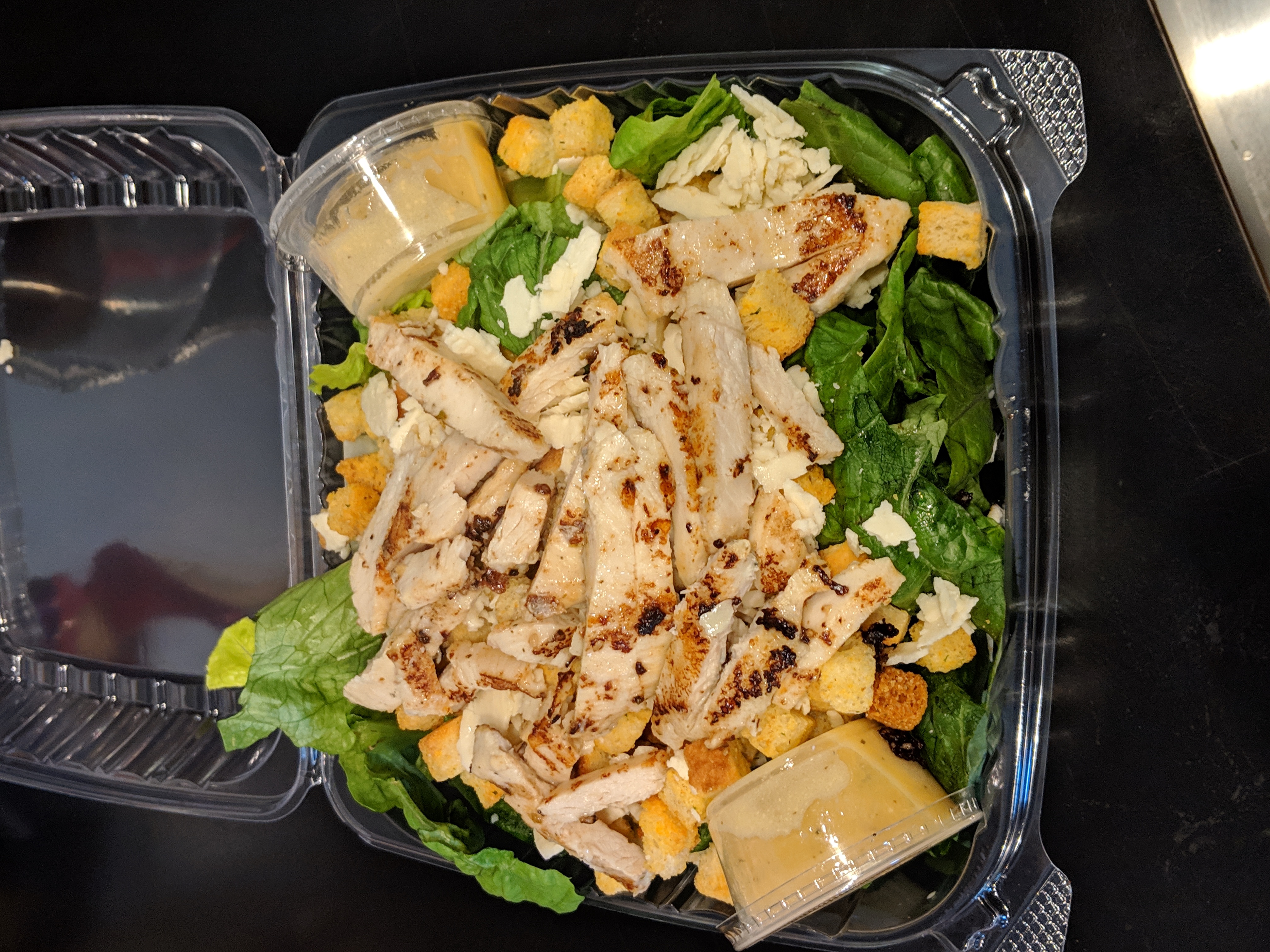 Order Caesar Salad with Chicken food online from Marco Italian Deli store, Buffalo on bringmethat.com