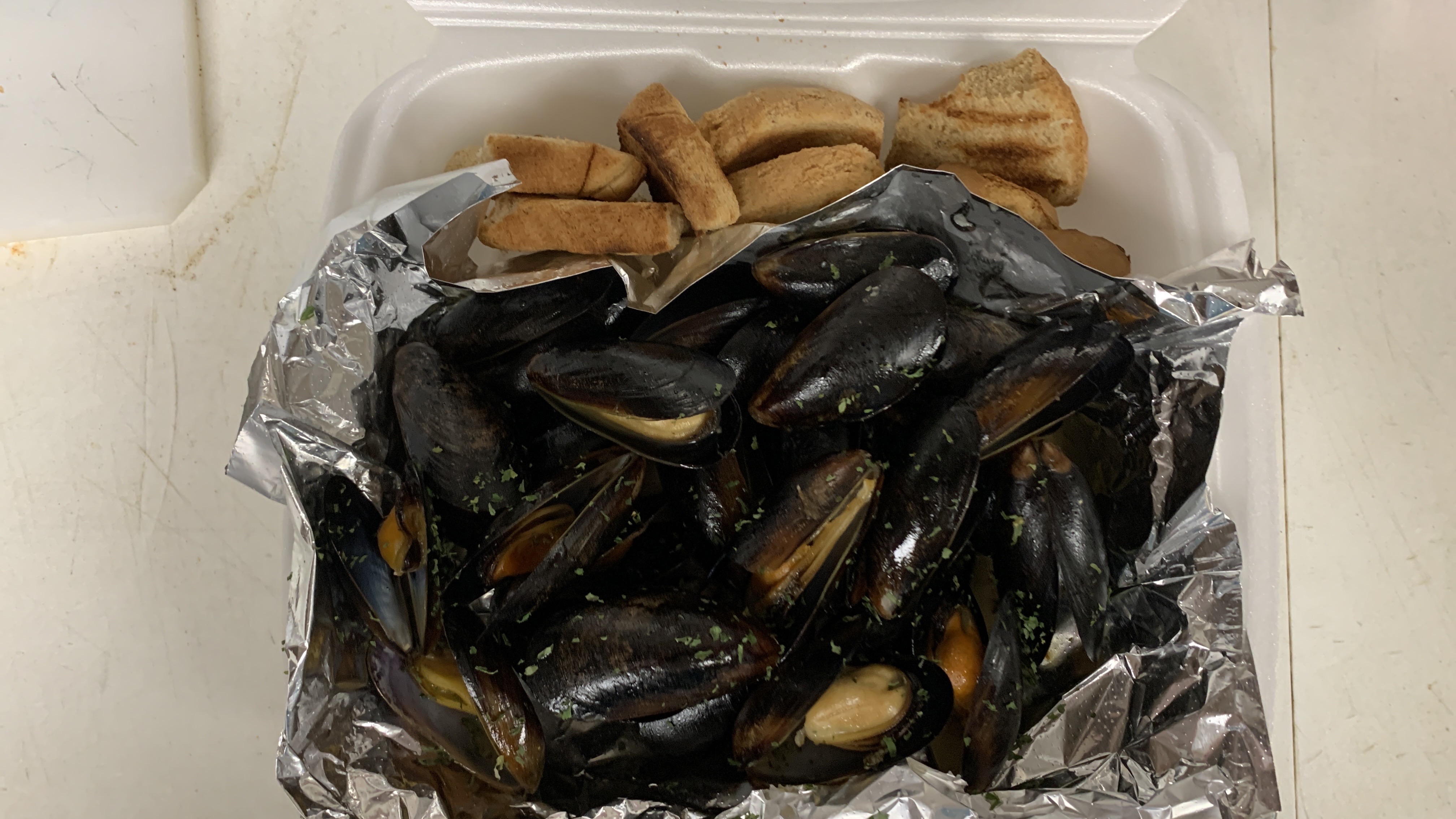 Order 1 lb. Steamed Mussels food online from Waterman Pride Seafood store, Nottingham on bringmethat.com