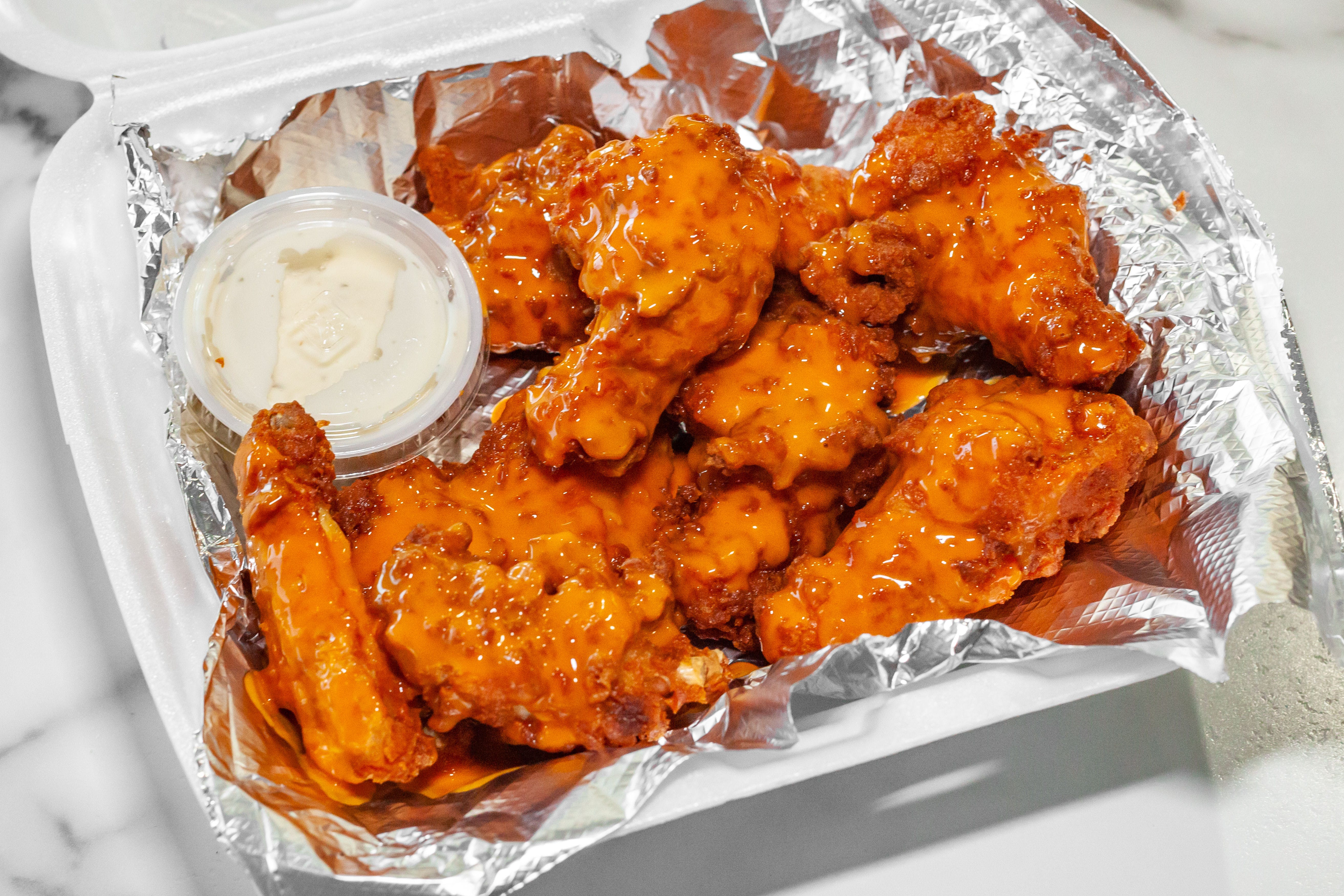 Order Buffalo Wings - 10 Pieces food online from Mama's Pizza store, Fredericksburg on bringmethat.com