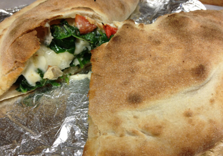 Order * Roasted Vegetable and Caramelized Onion Calzone food online from La Befana store, Allston on bringmethat.com