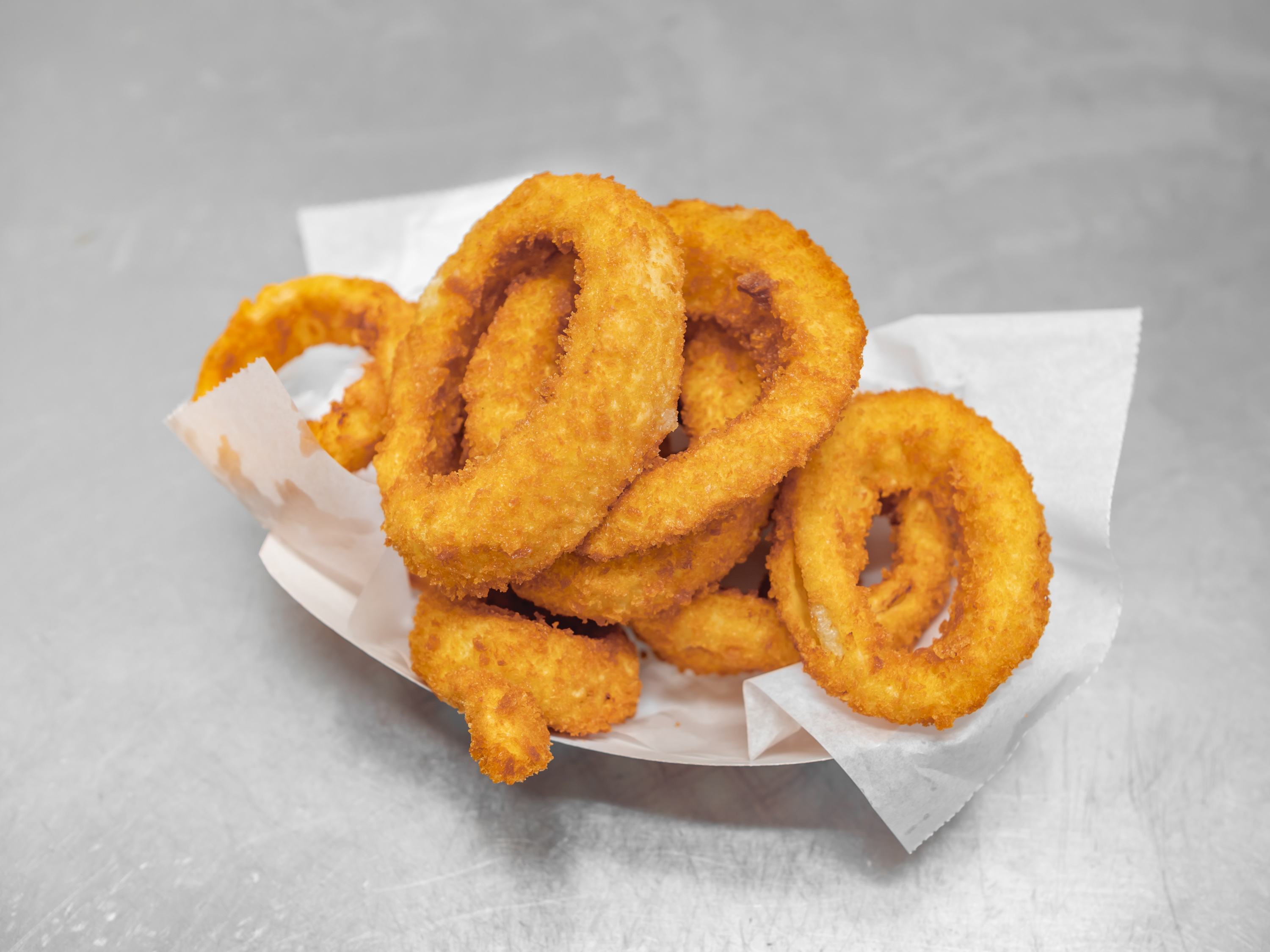 Order Onion Rings food online from Pops Fish & Chicken Market store, Fairview Heights on bringmethat.com