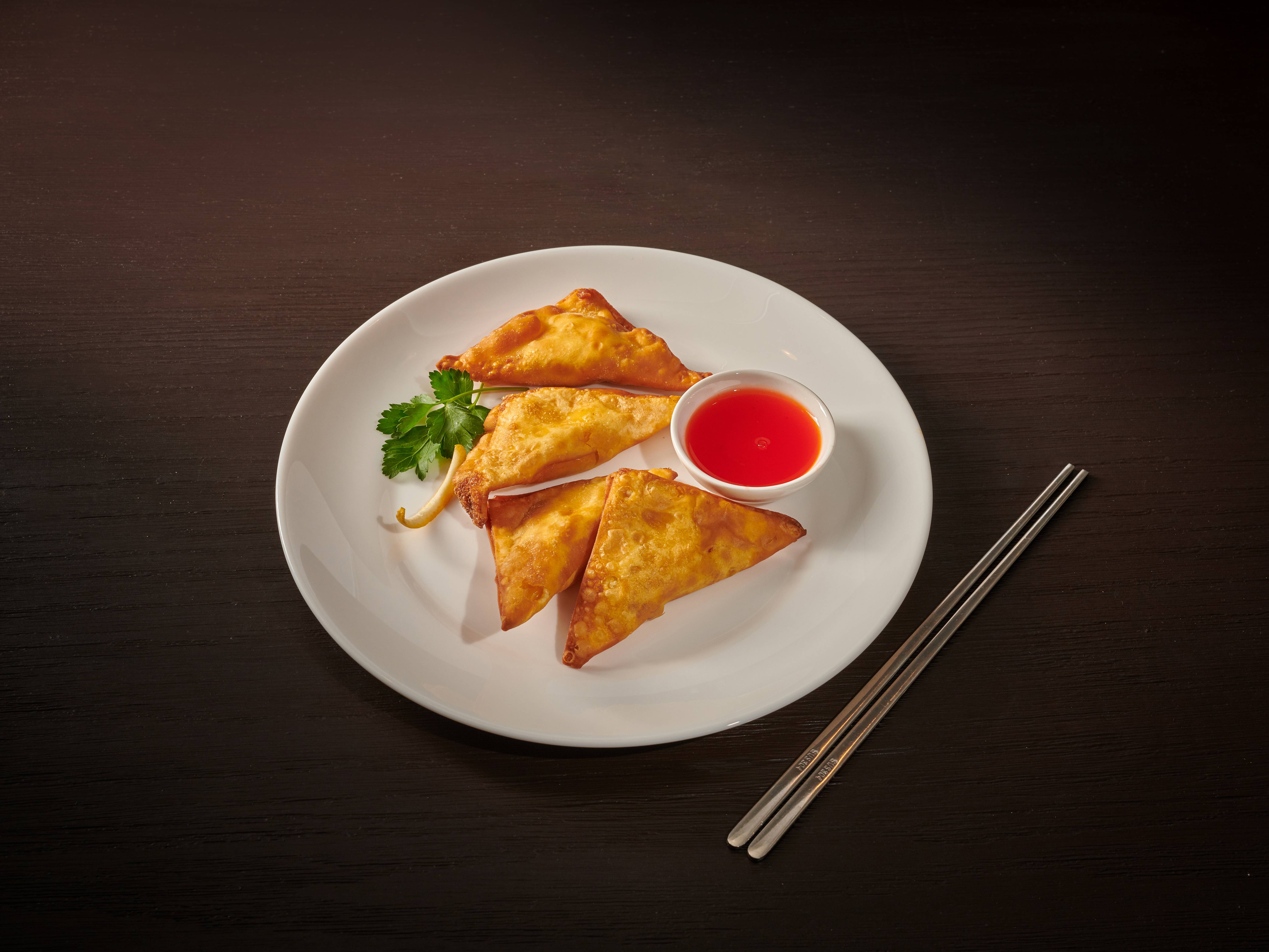 Order A15. 4 Piece Crab Rangoon food online from House of Fortune store, Germantown on bringmethat.com