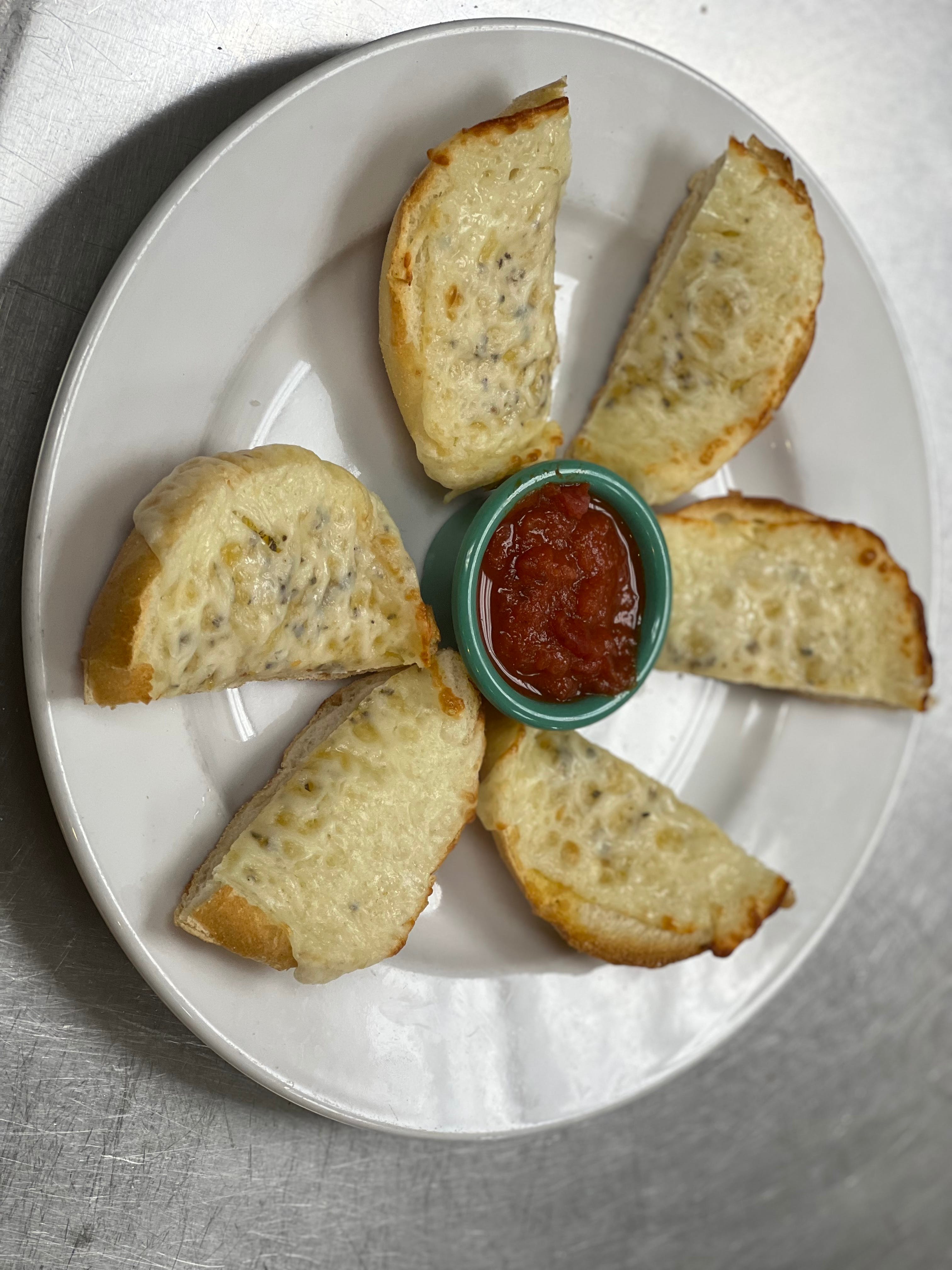 Order Garlic Bread with Cheese - Appetizer food online from Zeno Italian Grill store, Pembroke on bringmethat.com