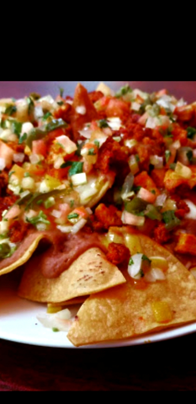 Order Nachos Deluxe food online from Alondra's Cuisine store, Middletown on bringmethat.com