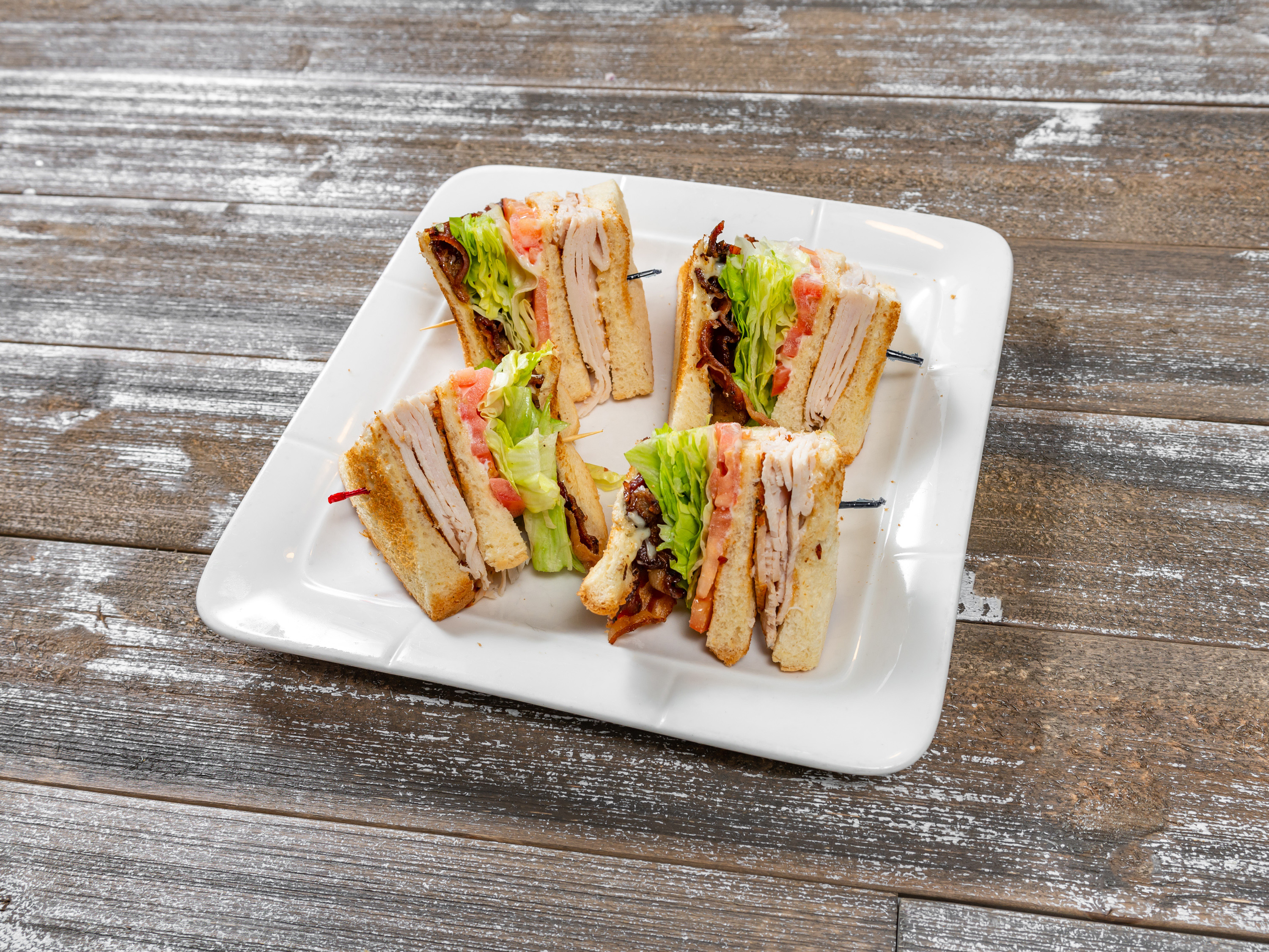 Order Roasted Turkey Club Sandwich food online from The Legend Restaurant And Bakery store, New Castle on bringmethat.com