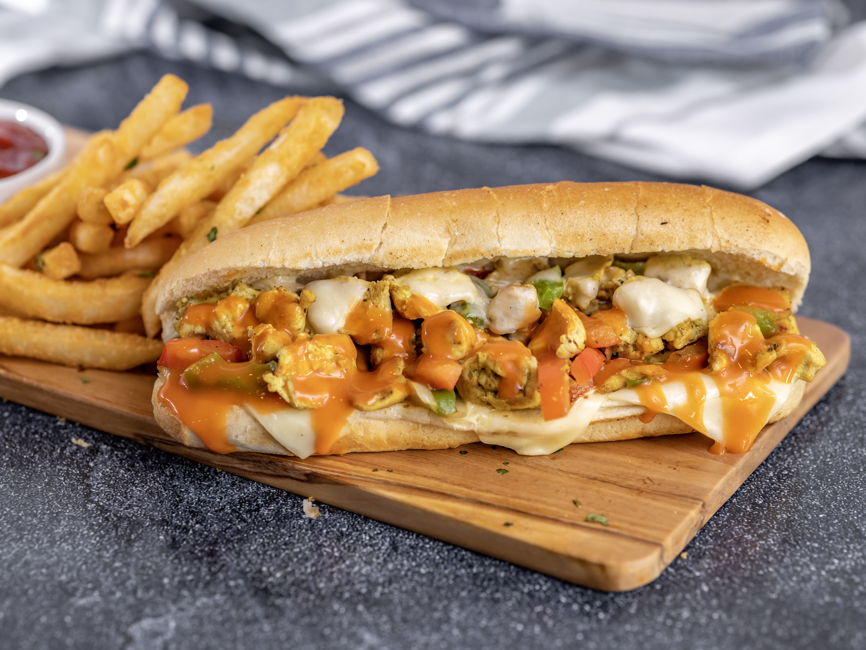 Order Chicken Philly Sandwich food online from Hooks Fish and Chips store, Minneapolis on bringmethat.com