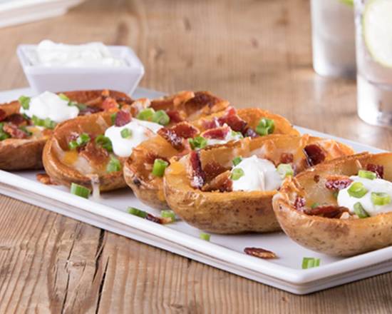 Order Potato Skins food online from American Grilled Cheese Company store, Huntersville on bringmethat.com