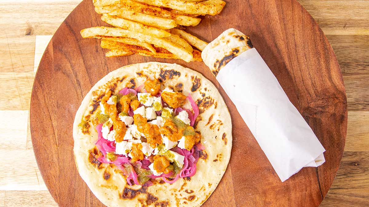 Order 2 Paneer Masala Kati Roll with Fries food online from Krazi Kebob store, College Park on bringmethat.com