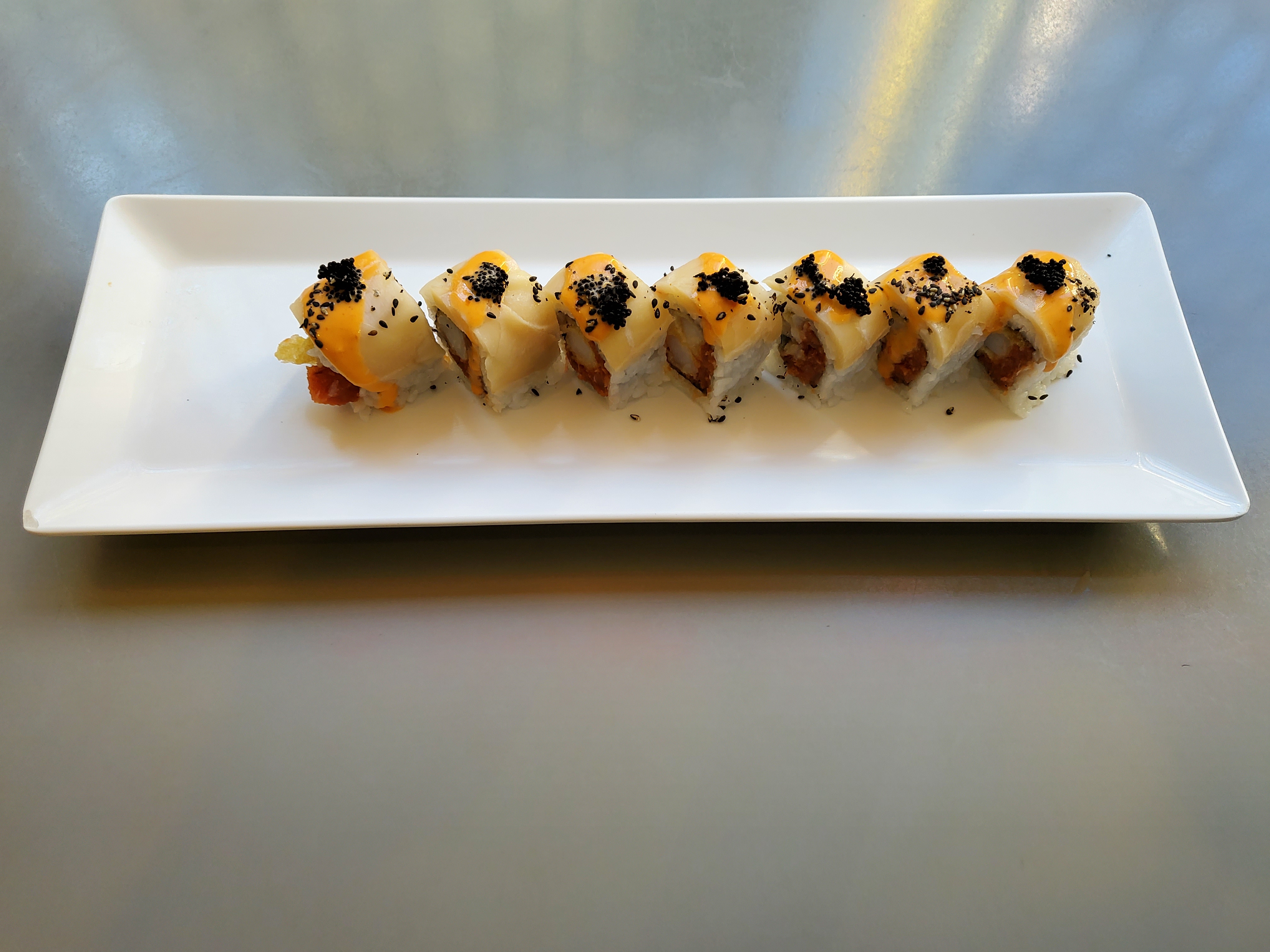 Order Black and White Roll food online from Sushitoni store, San Francisco on bringmethat.com