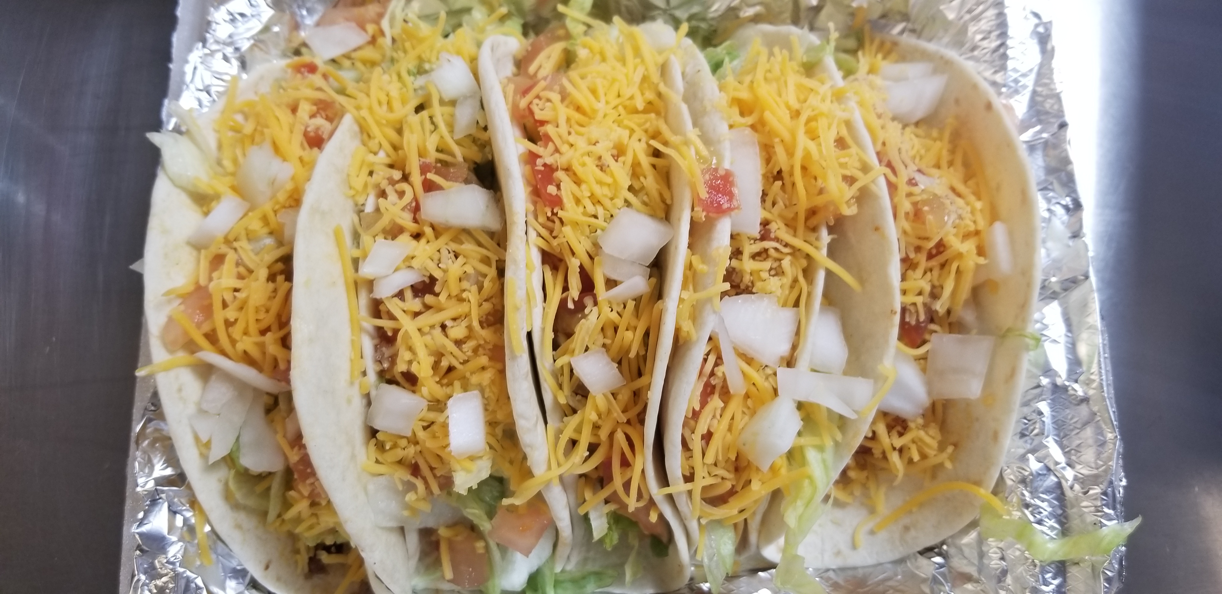 Order Tacos food online from C Ruff International Cuisine store, Detroit on bringmethat.com