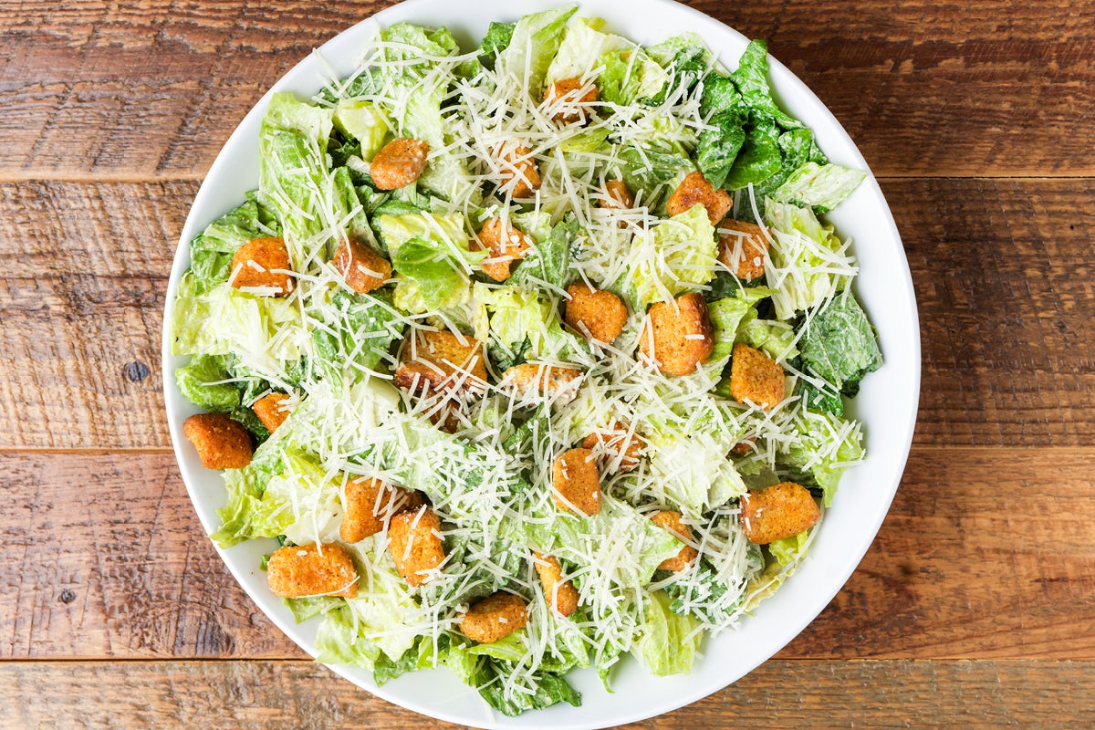 Order Brisbane Caesar Salad food online from Outback Steakhouse store, Atlanta on bringmethat.com