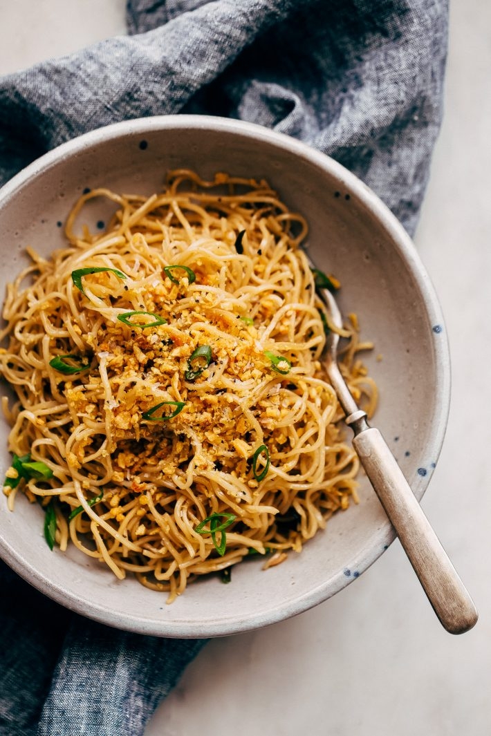 Order GARLIC NOODLES food online from District One Kitchen & Bar store, Las Vegas on bringmethat.com