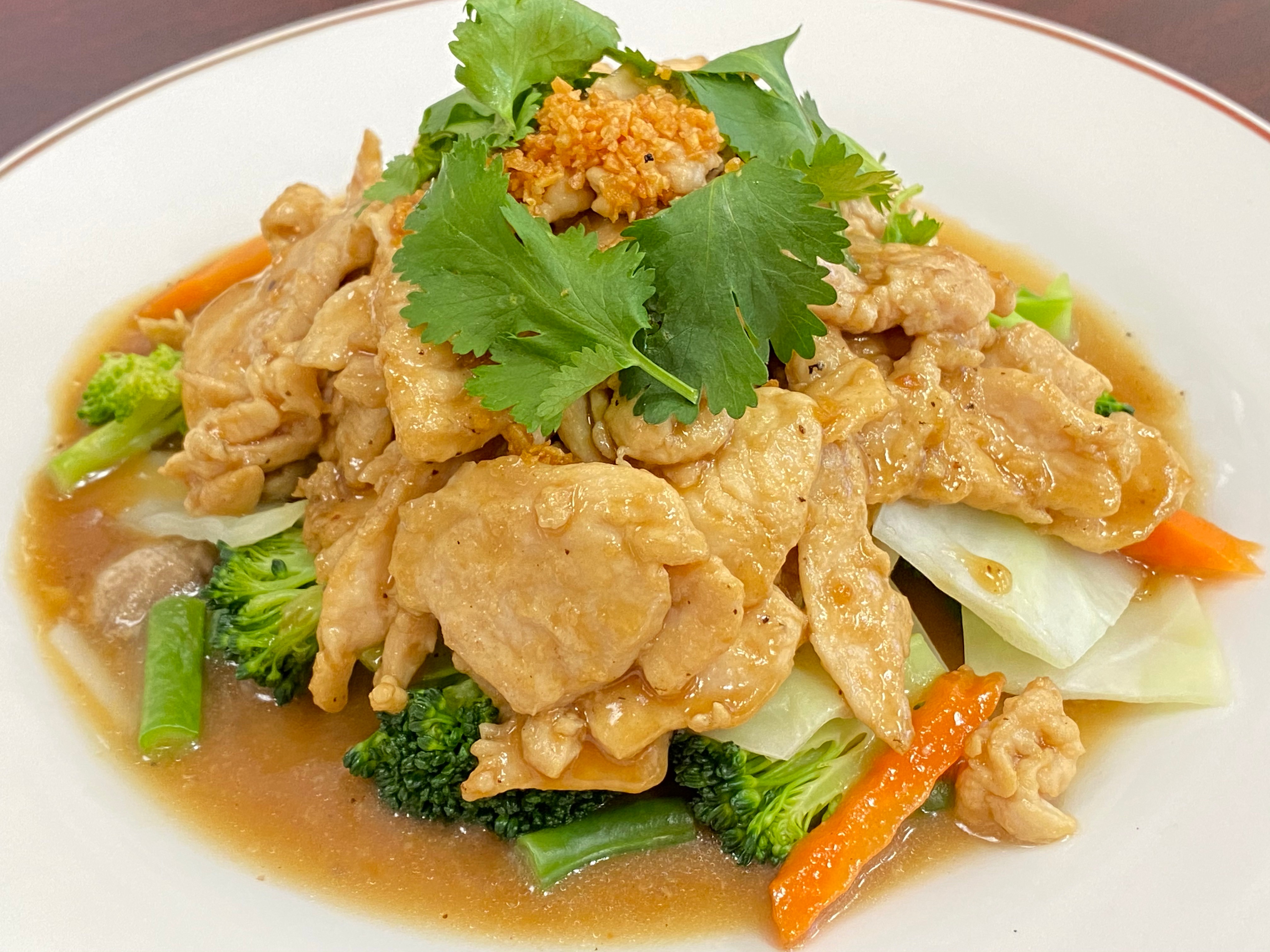 Order 2. Moo/Kai Kratiam food online from Thai Y'all store, Boiling Springs on bringmethat.com