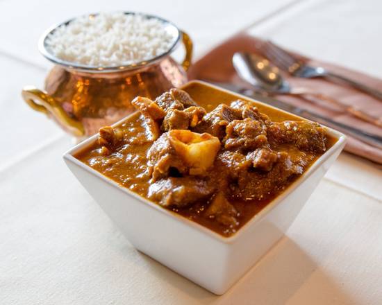 Order Kukhura Ko Maasu (Chicken With Bone) food online from Chicago Curry House store, Chicago on bringmethat.com