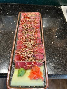 Order Tuna Tataki food online from Sushi Sakura store, Pikesville on bringmethat.com