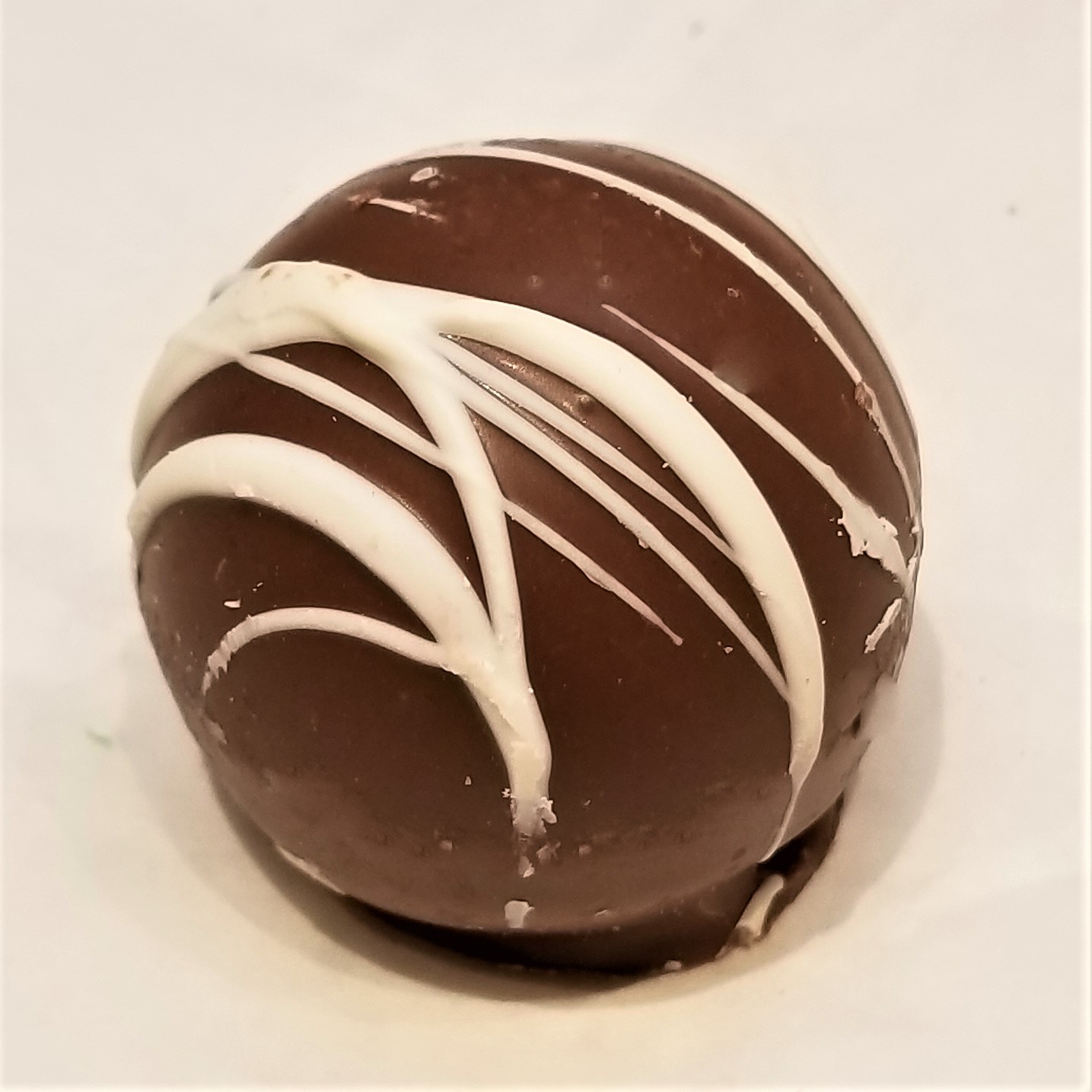 Order Rum Truffle food online from Rocky Mountain Chocolate Factory store, Tempe on bringmethat.com