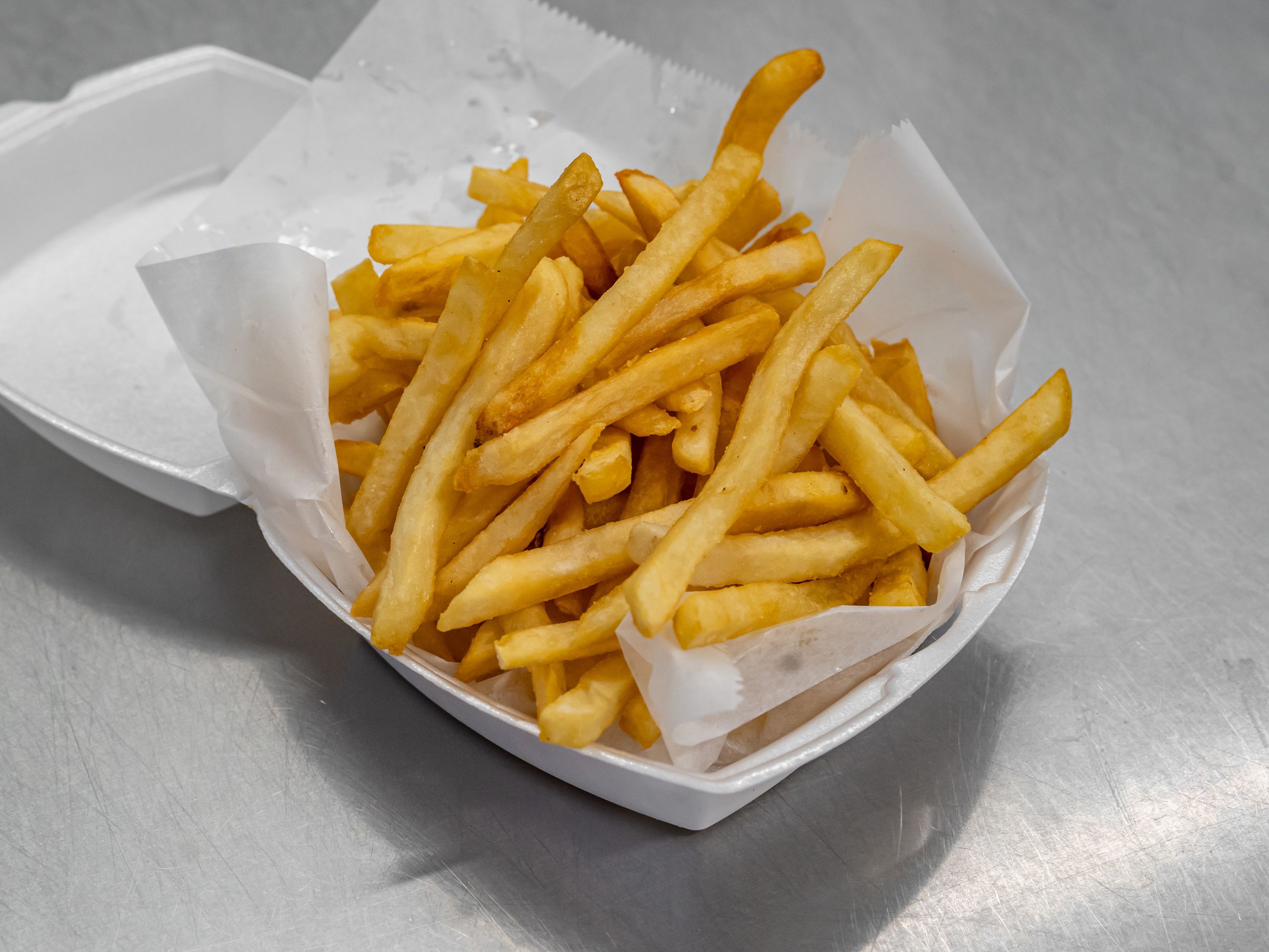Order French Fries food online from Uncle Tomy's Pizza & Wings store, Philadelphia on bringmethat.com