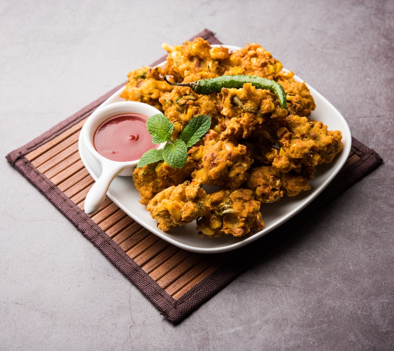 Order VEGETABLE PAKORA food online from India Oven store, El Dorado Hills on bringmethat.com