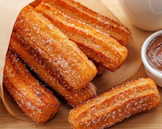 Order Churros (6 Pc) food online from Vegetarian Mexican Lounge store, Richardson on bringmethat.com