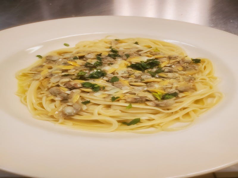 Order Linguini with White Clam Sauce - Pasta food online from Pizza Leone store, Fairfield on bringmethat.com