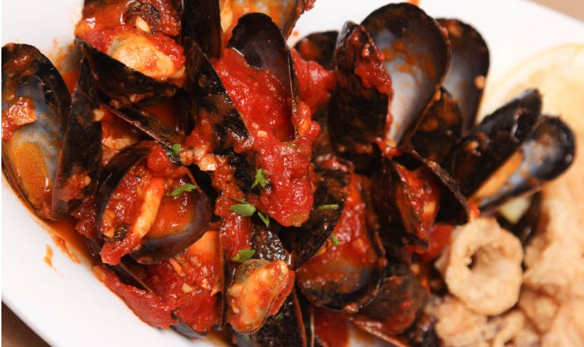 Order Clams in Red Sauce - Entree food online from Ciro Pizza Cafe store, Staten Island on bringmethat.com