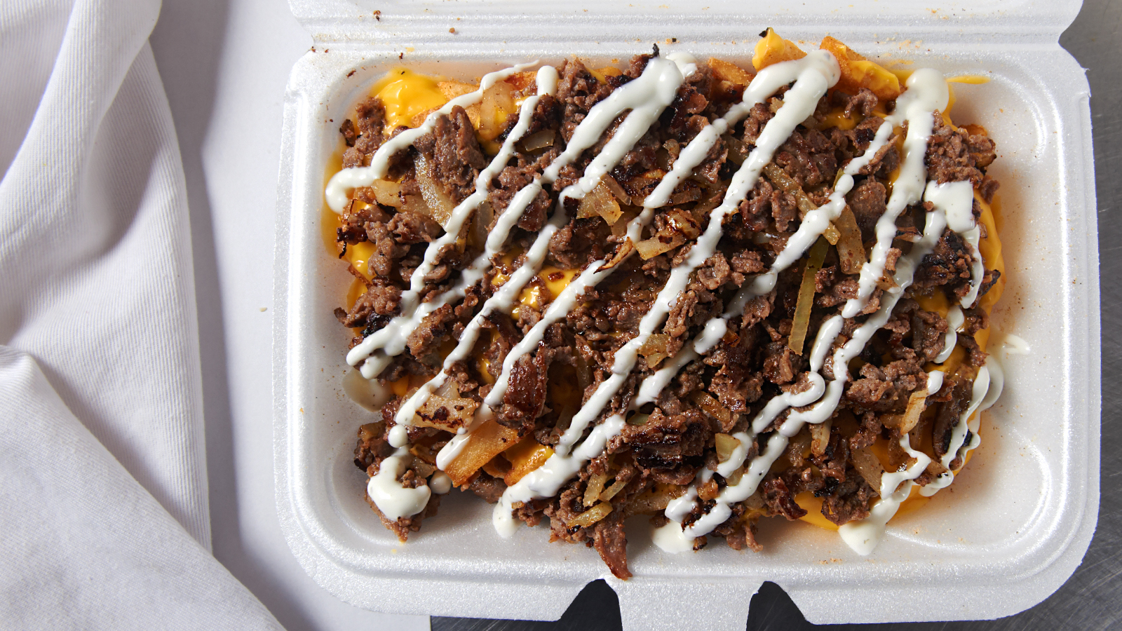 Order Dirty Fries food online from Chillie's Deli store, Cleveland on bringmethat.com