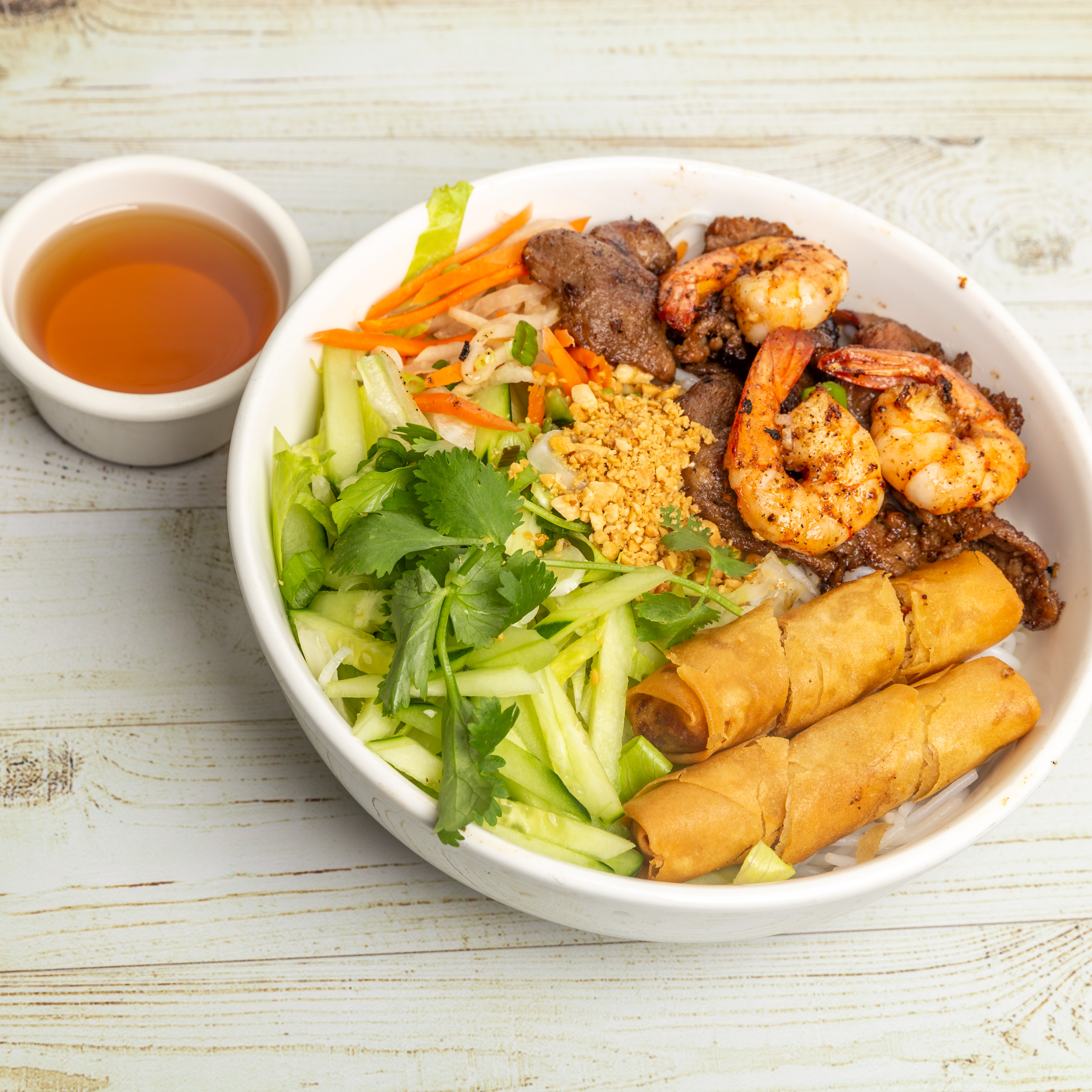 Order 19A. Vermicelli with Egg Roll, Grilled Pork and Grilled Shrimp food online from Pacific Noodle House store, Compton on bringmethat.com